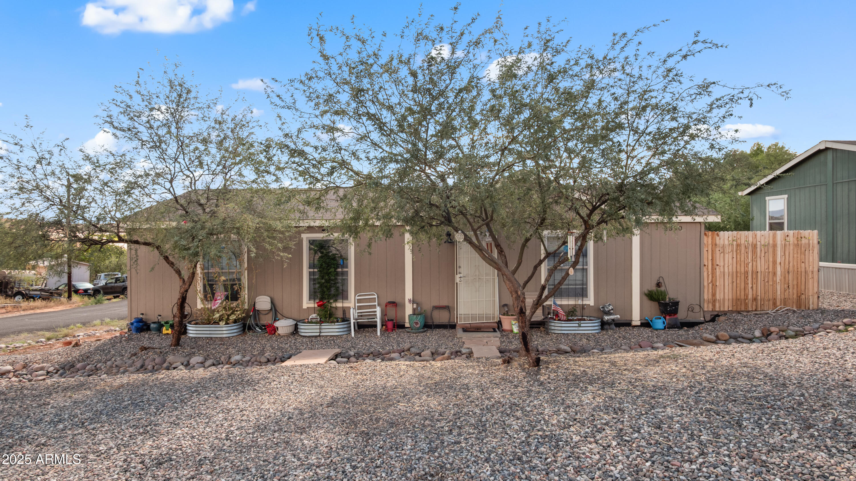 Welcome home to this charming 3-bedroom, 2-bath manufactured home, built in 2021 and nestled in the quiet community of Cornville, AZ. With 1,012 sq. ft. of thoughtfully designed living space, this home offers a cozy and inviting atmosphere perfect for relaxed everyday living. You'll love the open-concept layout, bright kitchen with modern finishes, and split floor plan that offers privacy between the primary suite and guest rooms. While storage is modest and the yard is open, there's plenty of potential to make it your own outdoor retreat. Whether you're settling down, just starting out, or looking for a peaceful getaway, this newer home offers comfort, simplicity, and a great location—just minutes from scenic trails, local vineyards, and the charm of nearby Cottonwood and Sedona.