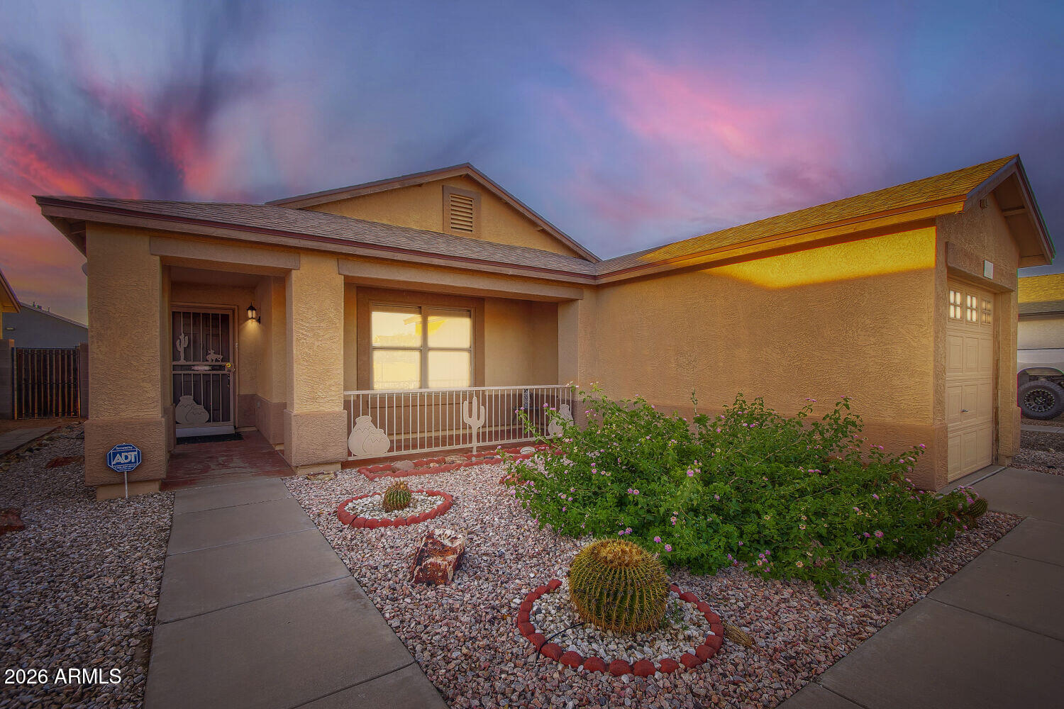 CHARMING COZY HOME WITH A GREAT POTENTIAL...IT FEATURES AN INVITING ENTRANCE WITH A SITTING AREA TO ENJOY COOL ARIZONA WEATHER; INSIDE YOU WILL FIND GOOD SIZE EAT IN KITCHEN; GREAT SIZE INSIDE LAUNDRY ROOM WITH SHELVING FOR EXTRA STORAGE; BEDROOMS INCLUDE LARGER CLOSETS; IF YOU WANT TO BE INSIDE BUT HAVE A FEELING OF BEING OUT DOORS? HOW ABOUT AN ENCLOSED ARIZONA ROOM WITH WRAP AROUND WINDOWS AND A MINI SPLIT TO KEEP YOU COOL; BACK PATIO REQUIRES LOW MAINTENANCE WITH A STORAGE SHED FOR ALL OUTDOOR TOOLS/TOYS