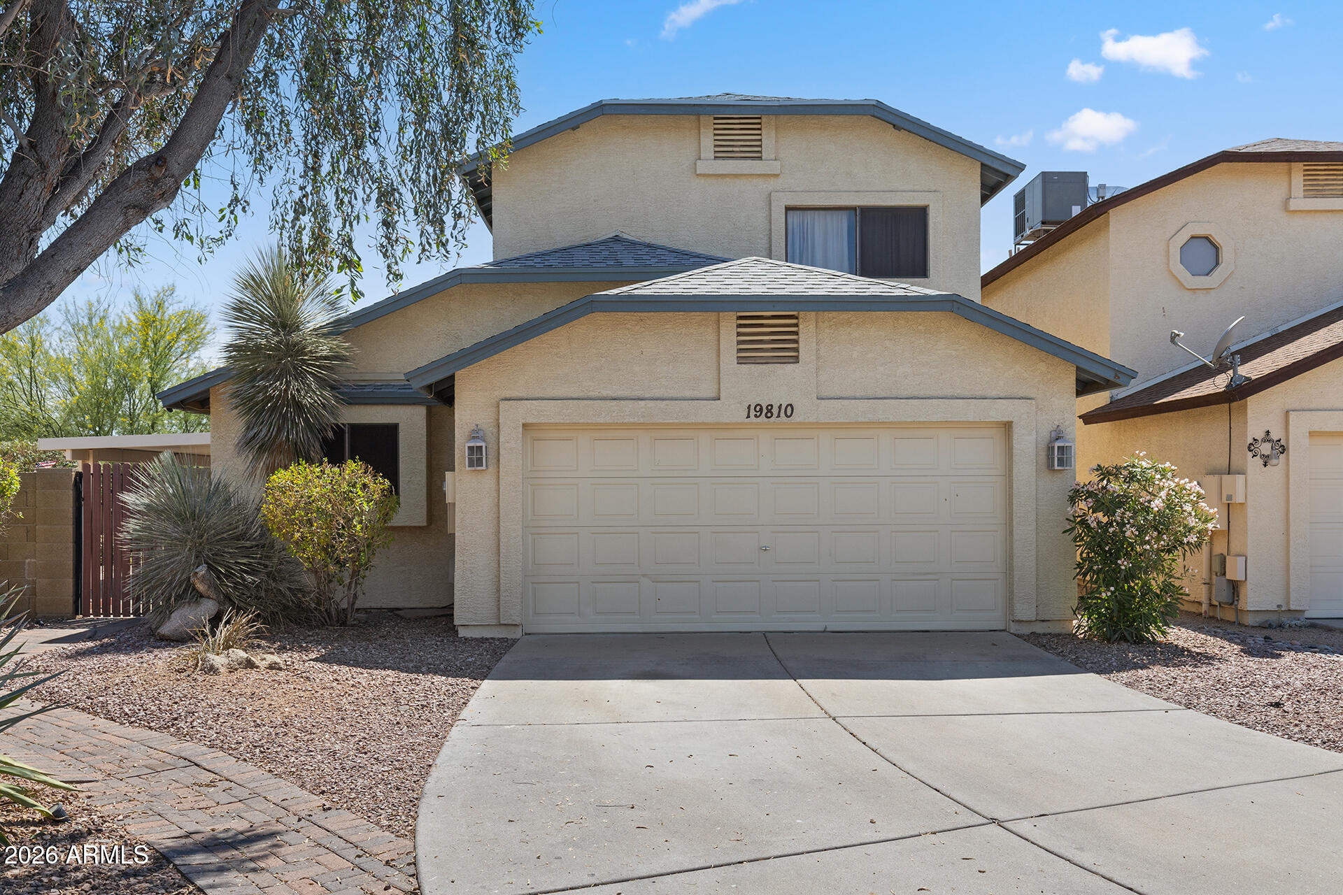 The largest home on the largest lot in the community! Situated on a sprawling 11,348 sqft cul-de-sac lot, this spacious 4-bed, 2.5-bath two-story home offers 2,120 sqft of bright, open living space in a fantastic location near Loop 101 access. Features a downstairs primary suite. The open kitchen includes an eat-in bay area, pantry, and vibrant cabinetry, flowing seamlessly into the bright family room with smooth wood-look plank flooring. Step outside to enjoy wrap-around patios and a beautifully landscaped backyard with mature trees and bordered turf, perfect for relaxing or entertaining. Space, charm, and location come together perfectly in this exceptional home!