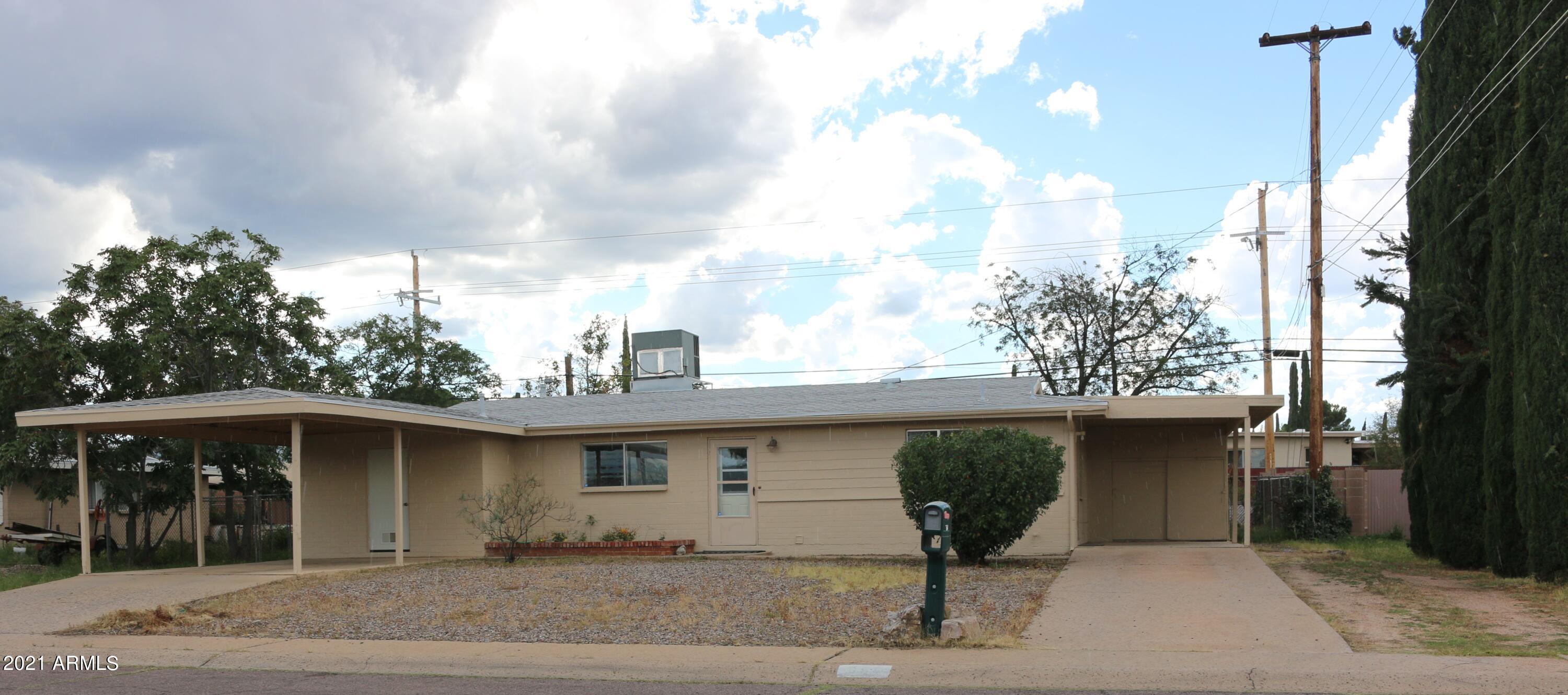 Ready to Move In! Nice 4 bedroom, 2 bath home in Village Meadows subdivision. Freshly painted interior, and new carpet. Master bathroom has been recently remodeled.  Home has AC.  New roofing installed in 2020.   Large backyard.  Centrally located with convenient access to Fort Huachuca.
