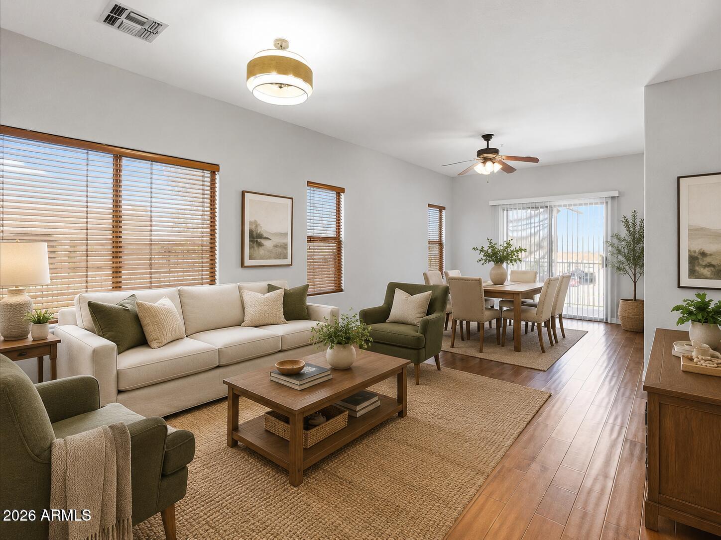 Welcome to this beautiful, spacious and private 2-bed, 2-bath Fountain Hills condo with beautiful mountain and city light views. This bright, open layout features hand-scraped wood floors, tile, and a cozy upgraded kitchen with maple cabinetry, tiled countertops, pass-through, eat-in area, and separate dining space. Enjoy rare dual balconies, including one extra-large private balcony perfect for sunrise, sunset, and desert views. Additional highlights include double-pane patio doors and windows, full-size garage with opener, workbench, cabinets, and all appliances included. Low HOA and low maintenance. Close to Fountain Park, restaurants, shopping, and golf. Ideal full-time home, winter retreat, vacation home, or rental.