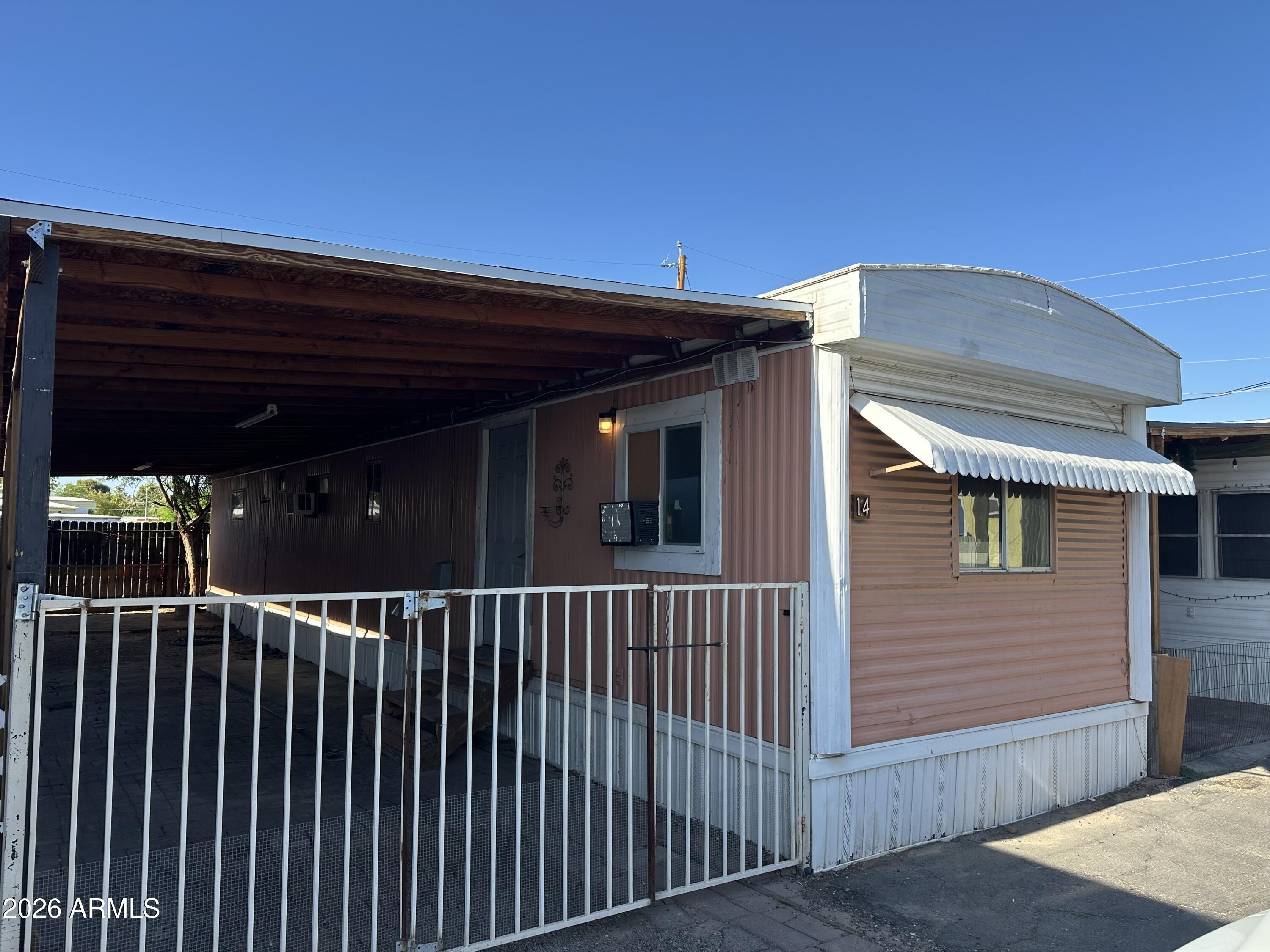 Lots of potential in this 3 bed 1.5 bathroom manufactured home with lots of parking, close to freeways and central phx. Lot does allow pets at no additional charge. This is not an age restricted community.