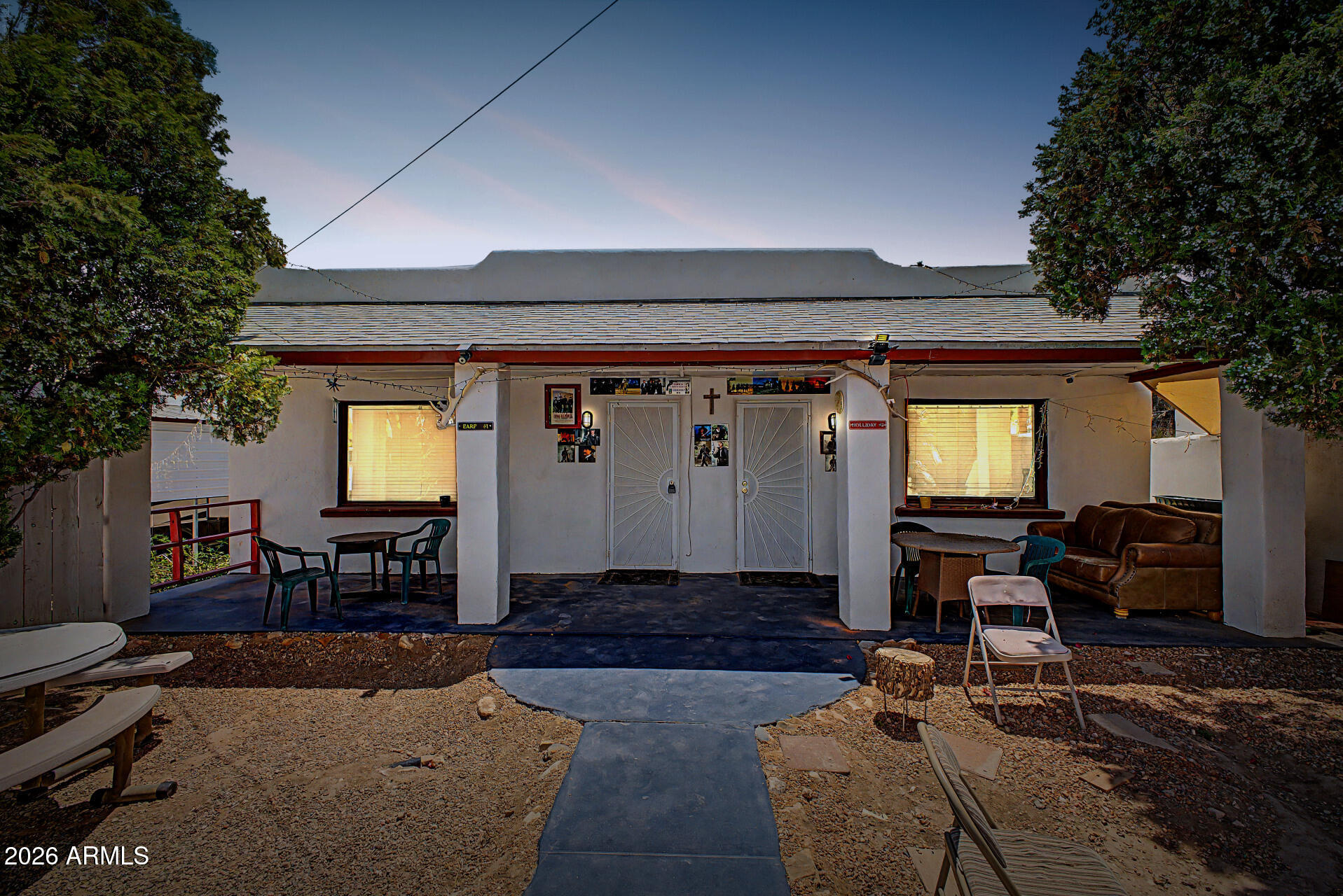 Discover an exceptional investment and lifestyle opportunity in the heart of Tombstone! Just a short stroll from the world-famous downtown Historic Tombstone district, this charming tri-plex offers the perfect blend of character, versatility, and income potential. Whether you're seeking multigenerational living, a lucrative rental property, or a combination of both, this unique property is ready to fit your vision. The property features three separate units, providing flexibility for long-term tenants, short-term vacation rentals, guest accommodations, or private living quarters. Adding even more value is a covered RV parking area with the potential to generate additional income or accommodate your own travel needs. Step outside and enjoy the inviting outdoor gathering space complete with a cozy gazebo and antique fire stove--perfect for relaxing evenings under the Arizona sky or entertaining guests with Old West charm. Located in the legendary "Town Too Tough to Die," this one-of-a-kind property offers endless possibilities in one of Arizona's most iconic destinations. Don't miss your chance to own a truly distinctive property in Historic Tombstone!