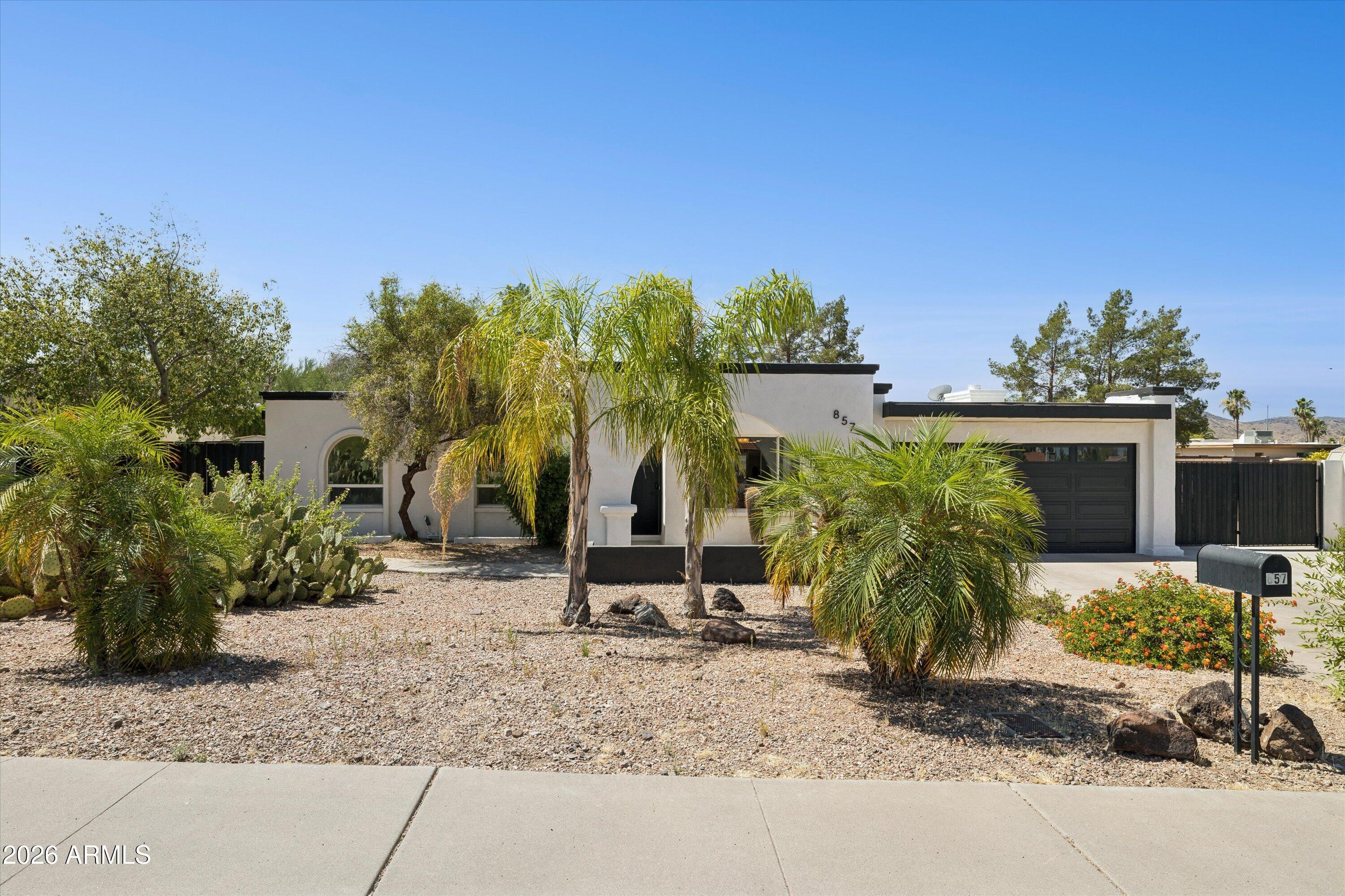 Located near the scenic foothills of Lookout Mountain, this beautifully updated single-level home offers space, flexibility, & expansive outdoor living spaces. Filled with natural light, spacious living areas, a cozy den ideal for an office, gym, or playroom, & a bright open feel throughout.  Modernized features include a new roof, kitchen cabinets, tastefully upgraded bathrooms, fresh interior/exterior paint, & tile flooring throughout the main living areas.  The elevated, oversized lot provides exceptional versatility with two RV gates, backyard parking, & room for trailers, toys, or additional vehicles. Step outside to enjoy the sparkling pool, oversized covered patio, & generous backyard space ready for relaxing, entertaining, or future customization. Conveniently located & no HOA.