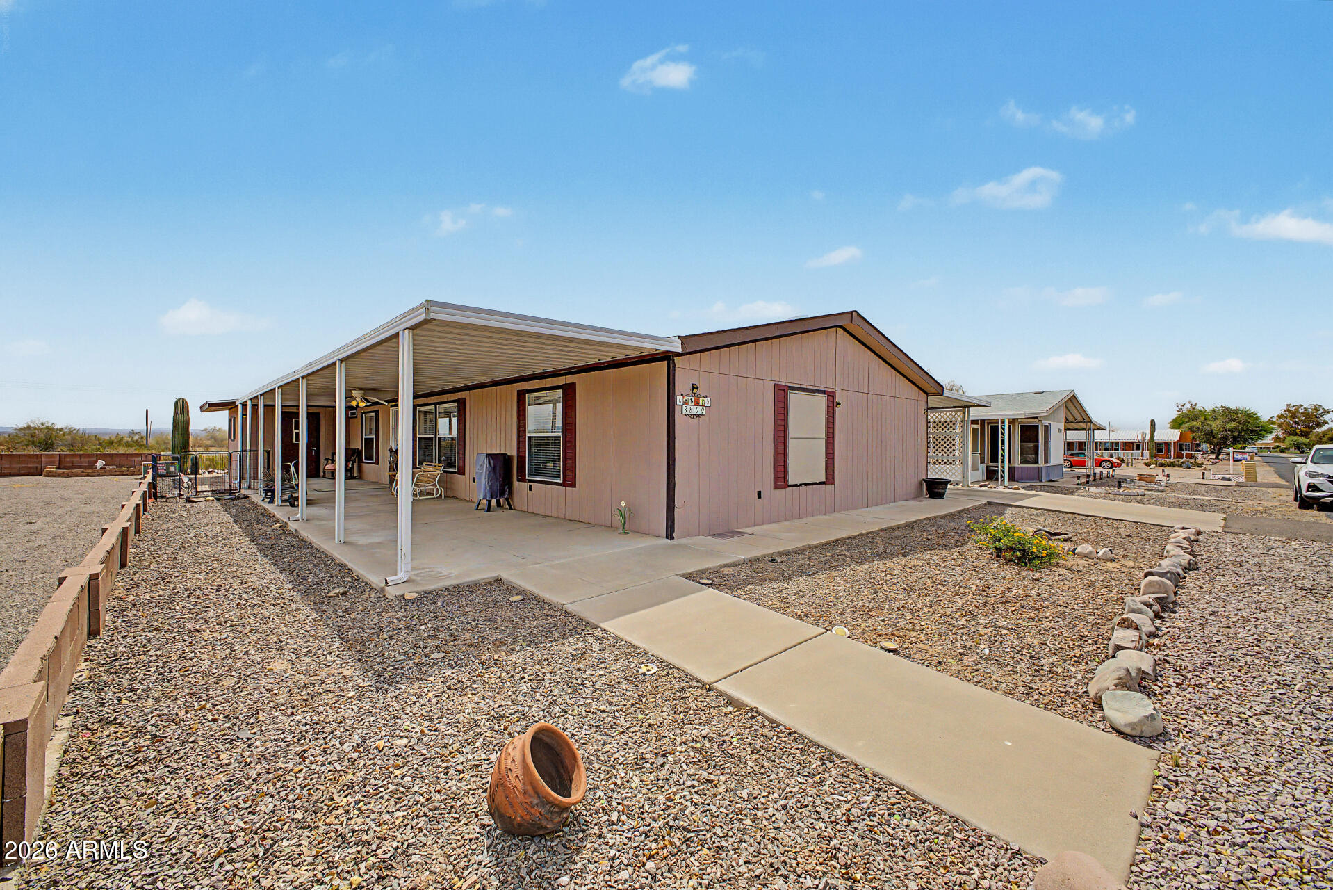 Walk into this bright open and amazing 3 bedroom 2 bath home with great mountain views and additional covered carport parking!!!! Split floor plan with master bedroom with large bathroom and garden soaking tub!! There are also 2 additional spacious bedrooms. The large open floor plan has vaulted ceilings with 2 large open living areas in the great room and family room. The open kitchen features beautiful white cabinets and a lot of counter space for cooking and entertaining. There is a large attached shed with workshop for projects!! Visit the community pool and golf course for your enjoyment!!