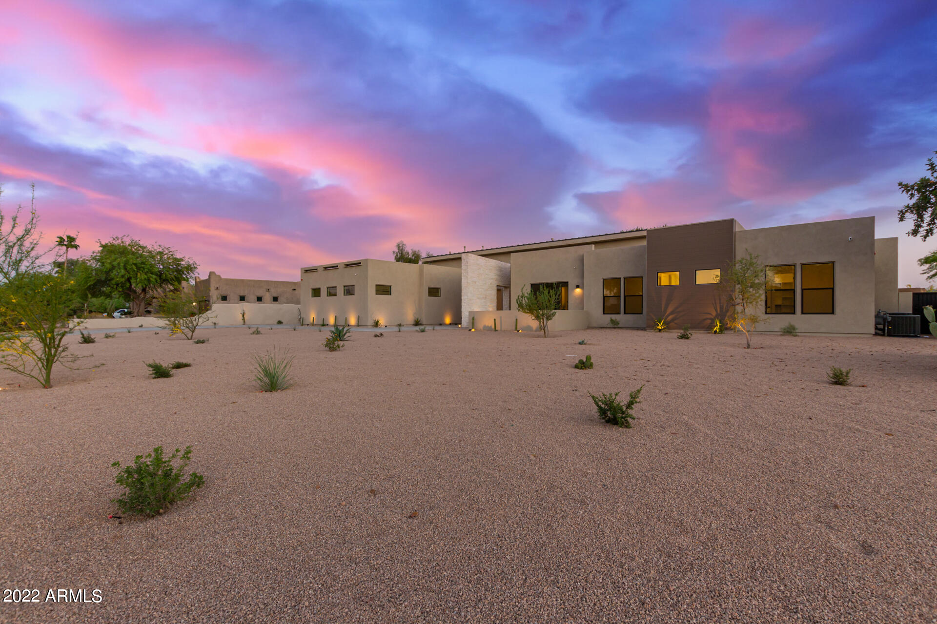 Luxurious new build in Scottsdale near Cholla and Scottsdale Rd. This amazing 4br 3.5ba + office and game room 3 car state of the art contemporary home sits on almost an acre size homesite. Large sparkling salt water play pool. Inside this modern contemporary you will find 4,484 SF of the finest finishes and selections from hardwood floors to soaring 18' ceilings. The home is prewired for home automation, surround sound, and in-ceiling speakers in the master, game room, and expansive back patio. The gourmet kitchen is fully equipped with Caesarstone, high end Sollid Evnii line cabinets, walk-in pantry and lots more. Landscaping included, Schedule a showing today to see this beautiful property.