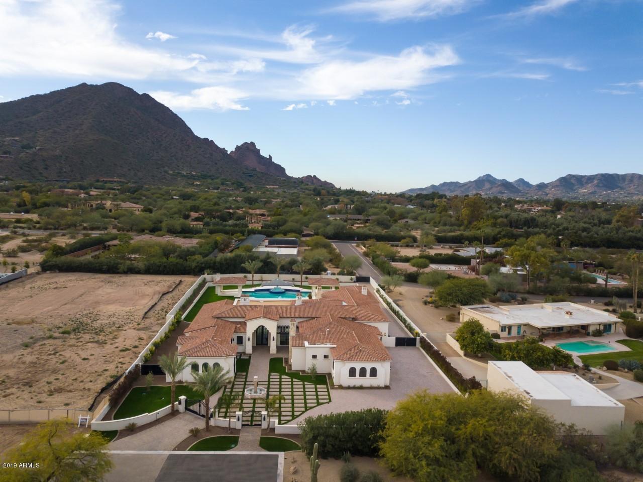 A new masterpiece now under construction by the phenomenal Regal American Homes--this stunner boasts over-the-top full profile Camelback Mtn views from your entire back of the home & all pool entertaining areas.  Featuring stunning finishes, high quality construction & gorgeous architectural drama you have come to love in each amazing Regal American custom home!! This resort style backyard will truly be one of kind w/ a huge resort style pool/spa/ramada boasting many water features & stunning Camelback Mtn views from every inch of the backyard! A beautiful gourmet chef's kitchen w/ Wolf/Sub-Zero/Asko Appl pkg. & custom cabinetry make this kitchen a show-stopper!  Enjoy your palatial master suite w/ walls of glass showcasing the jaw dropping Camelback Mtn views! Light, bright & airy!!