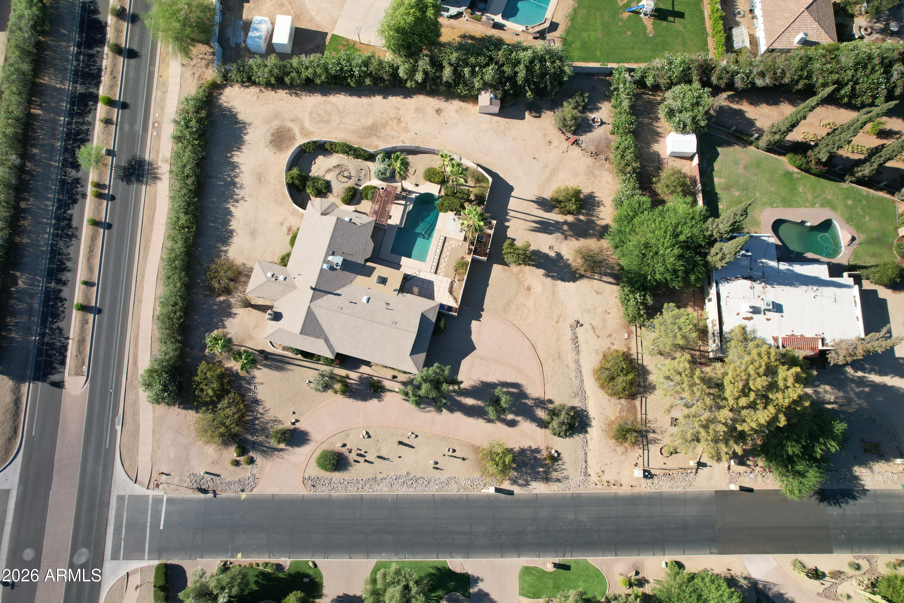 Lowest price home in Paradise Valley on an Acre!!  4 bed 3 bath home NO HOA! GREAT LOCATION! VIEW OF MUMMY MOUNTAIN! Beautiful acre corner lot with Desert Landscaping. Inner courtyard with Pool, Spa, Gazebo, Natural Gas Grill & Outdoor Fireplace. Gas Fireplace in Primary bedroom and living room. Great Family House w/ horse privileges. Sold AS-IS.