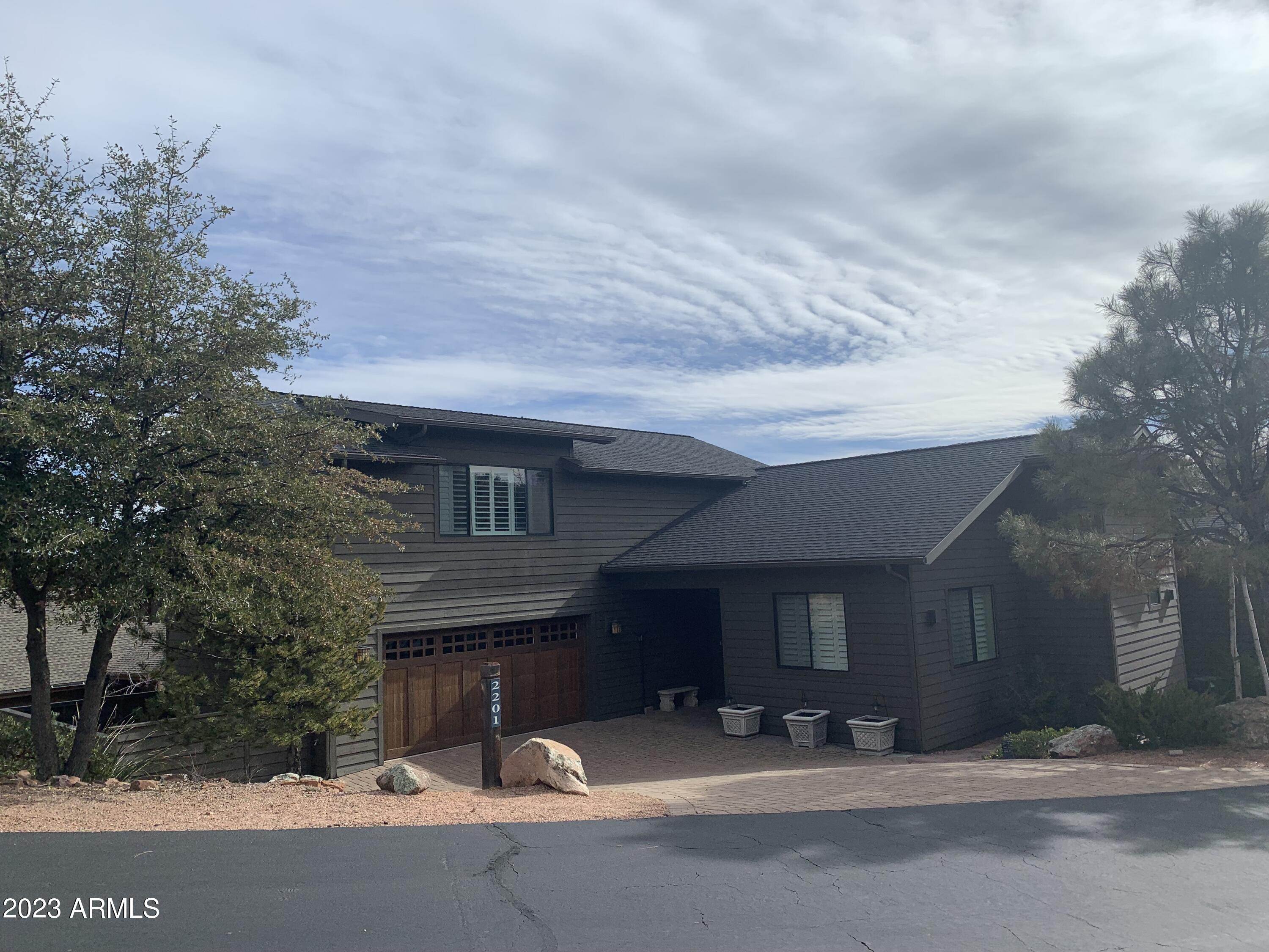 Luxury Golf Course Living in Chaparral Pines! This stunning 4,520-square-foot custom home offers 4 bedrooms, 5 bathrooms, and an exceptional two-story floor plan designed for both comfortable living and entertaining. Situated within the prestigious gated Chaparral Pines Golf Community, the home enjoys beautiful golf course views and the privacy of Arizona's majestic Ponderosa pine forest.
Recent improvements add tremendous value and curb appeal, including a brand-new roof scheduled for installation, fresh exterior paint, and newly updated landscaping. The spacious interior features generous living areas, well-appointed bedrooms, and abundant natural light throughout. Whether relaxing with family or hosting guests, this home offers the perfect blend of elegance, comfort, and mountain charm