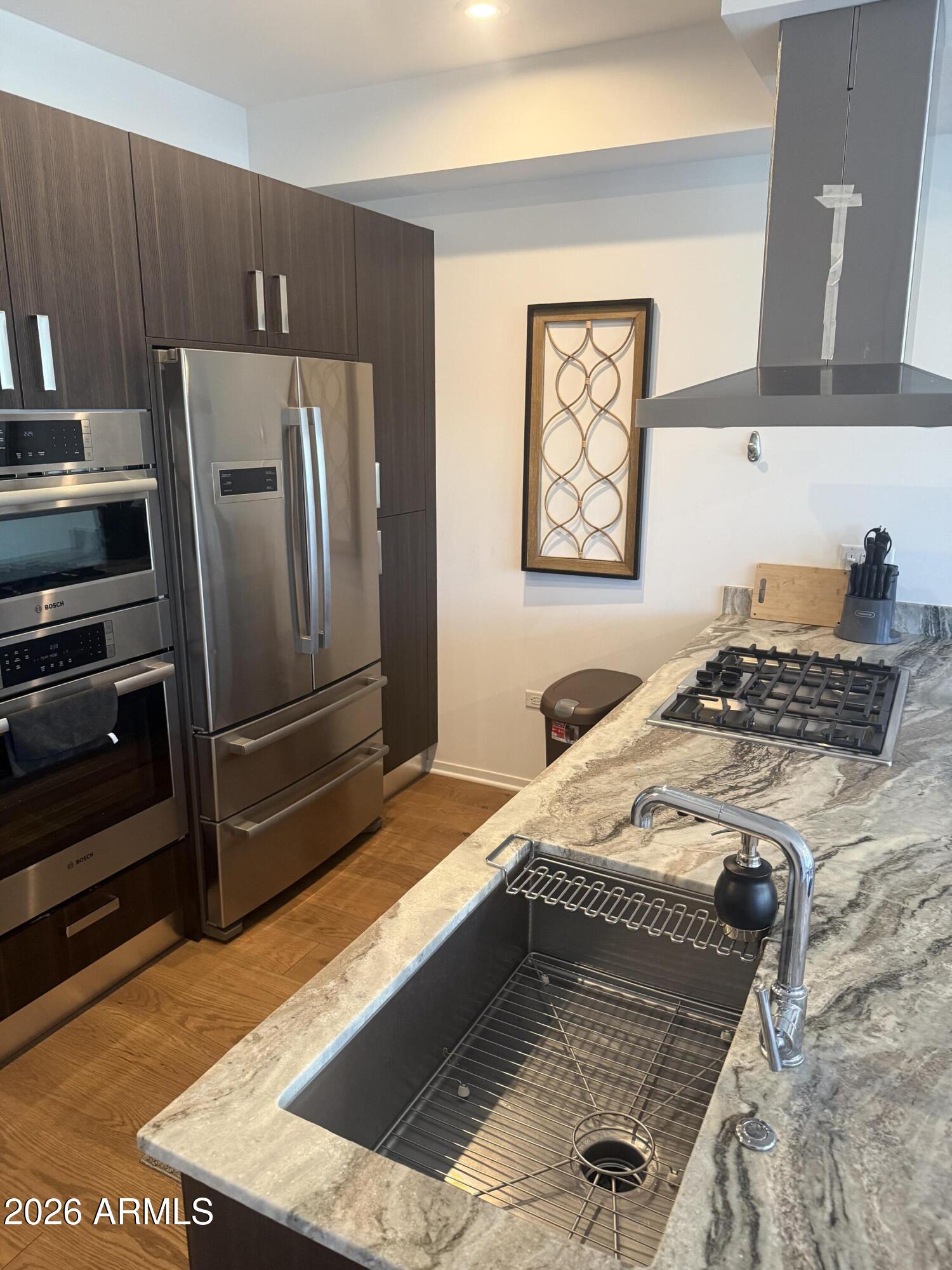 OPTIMA KIERLAND CENTER 7120 CONDOMINIUM 2ND AMD - Residential Lease