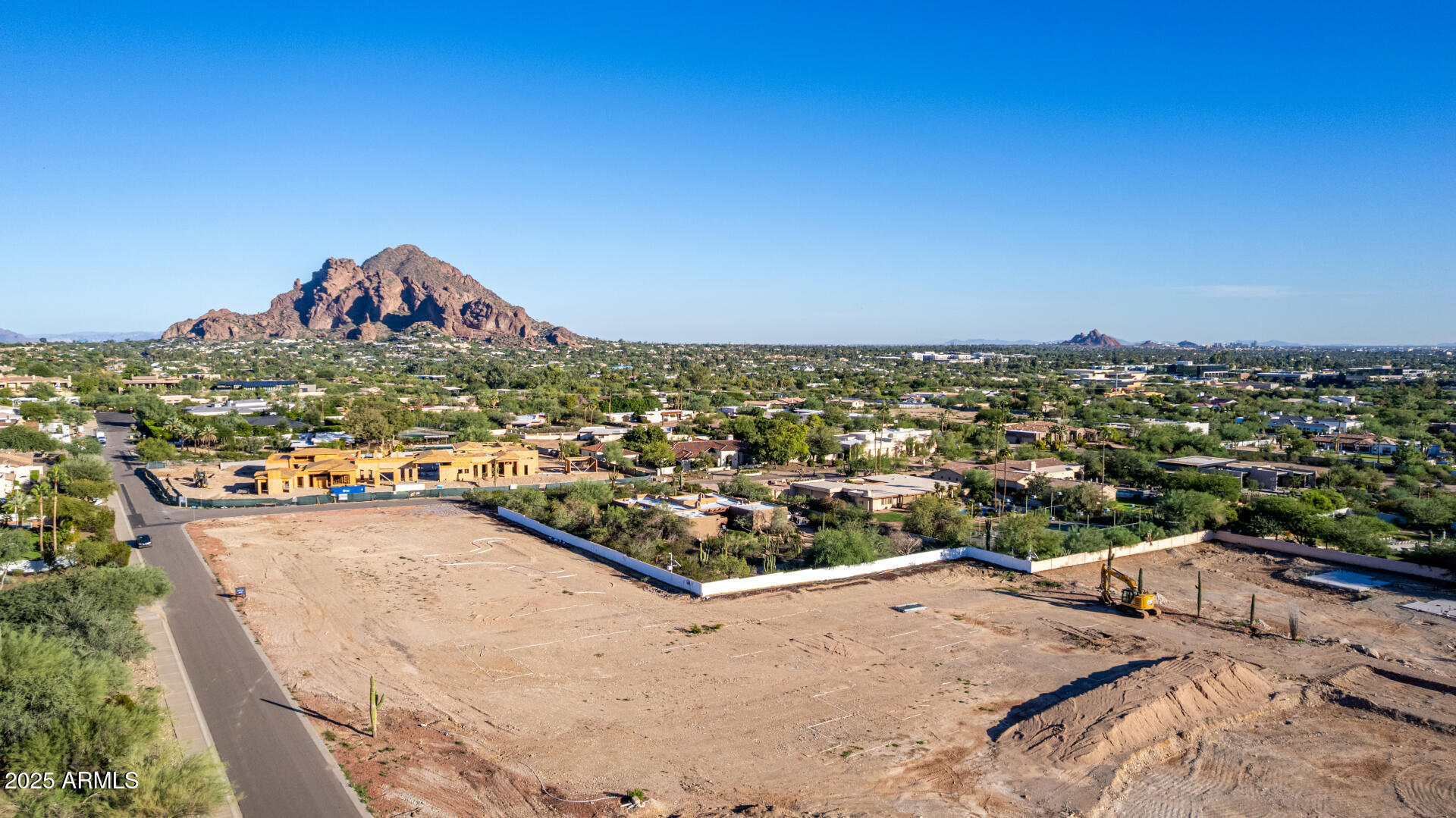 Rare opportunity in the heart of prestigious Palo Cristi Estates in Paradise Valley. This 2.22 acre flat, ready-to-build homesite offers the ultimate combination of privacy, prestige, and location. Create your own resort-style estate amid a neighborhood defined by architectural excellence and luxury living. Set along one of the area's most desirable corridors, this property provides unmatched convenience to Biltmore, Arcadia, and the Camelback Corridor's premier dining, shopping, and lifestyle destinations. A true resort-scale footprint with endless design possibilities — the perfect canvas for your custom masterpiece.