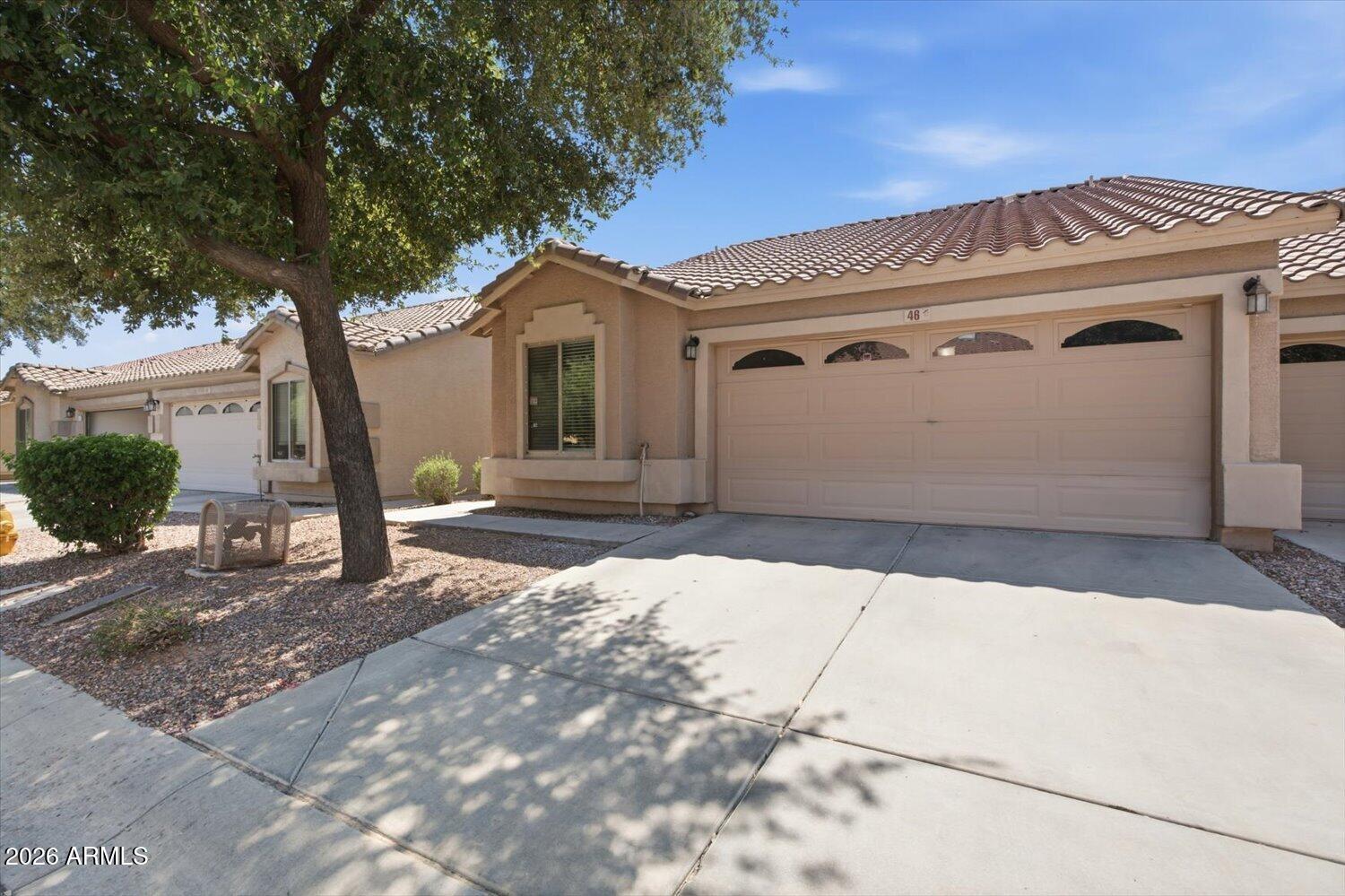 Move-in ready townhome located in the gated Foothills Paseo community in the Ahwatukee Foothills. Fresh interior paint and brand-new flooring provide a clean, refreshed feel throughout the home. The open floor plan features a spacious living area that flows into the kitchen and dining space, creating a comfortable layout for everyday living and entertaining. The primary suite includes an ensuite bath, while the attached 2-car garage offers additional convenience and storage. Residents enjoy access to the community pool, landscaped common areas, and nearby walking paths. Conveniently located near shopping, dining, South Mountain Preserve, hiking and biking trails, and freeway access.
