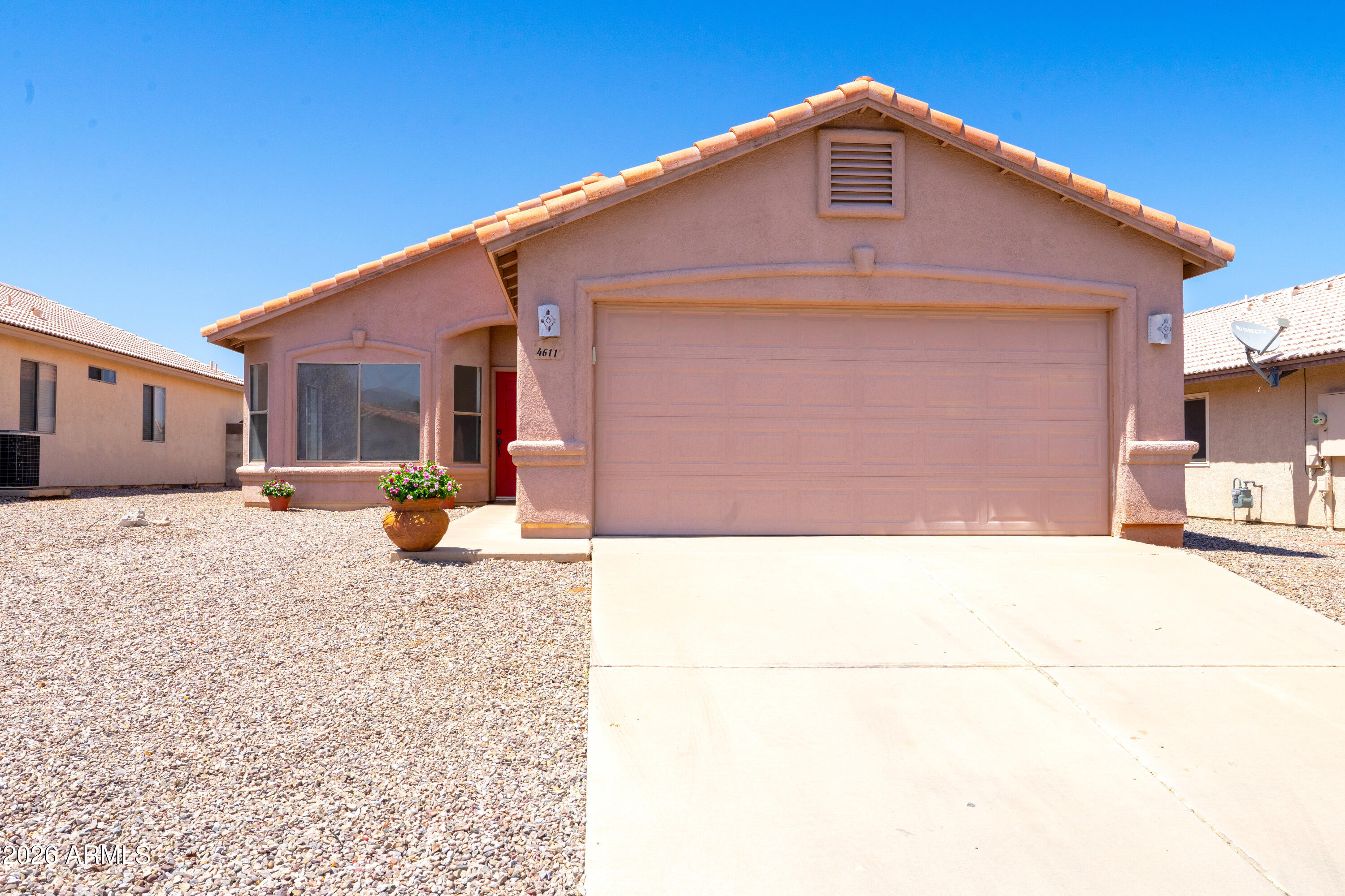 Super CUTE 3bd 2ba 1411sf. NO HOA and NO Back yard neighbors. Inside you'll love the natural light that radiates throughout the spacious living area.  Wonderfully functional breakfast bar kitchen with plenty of counter and cabinet space and stainless steel appliances (Refrigerator stays). Large primary suite with dual sinks, oversized soaking tub, walk in shower and walk in closet. Freshly painted inside. Newer water heater (2022). Patio roof recently redone. Washer and dryer stay (1 year new). Seller is offering a $2500 flooring allowance for the bedrooms.  Don't miss out on this charming home.