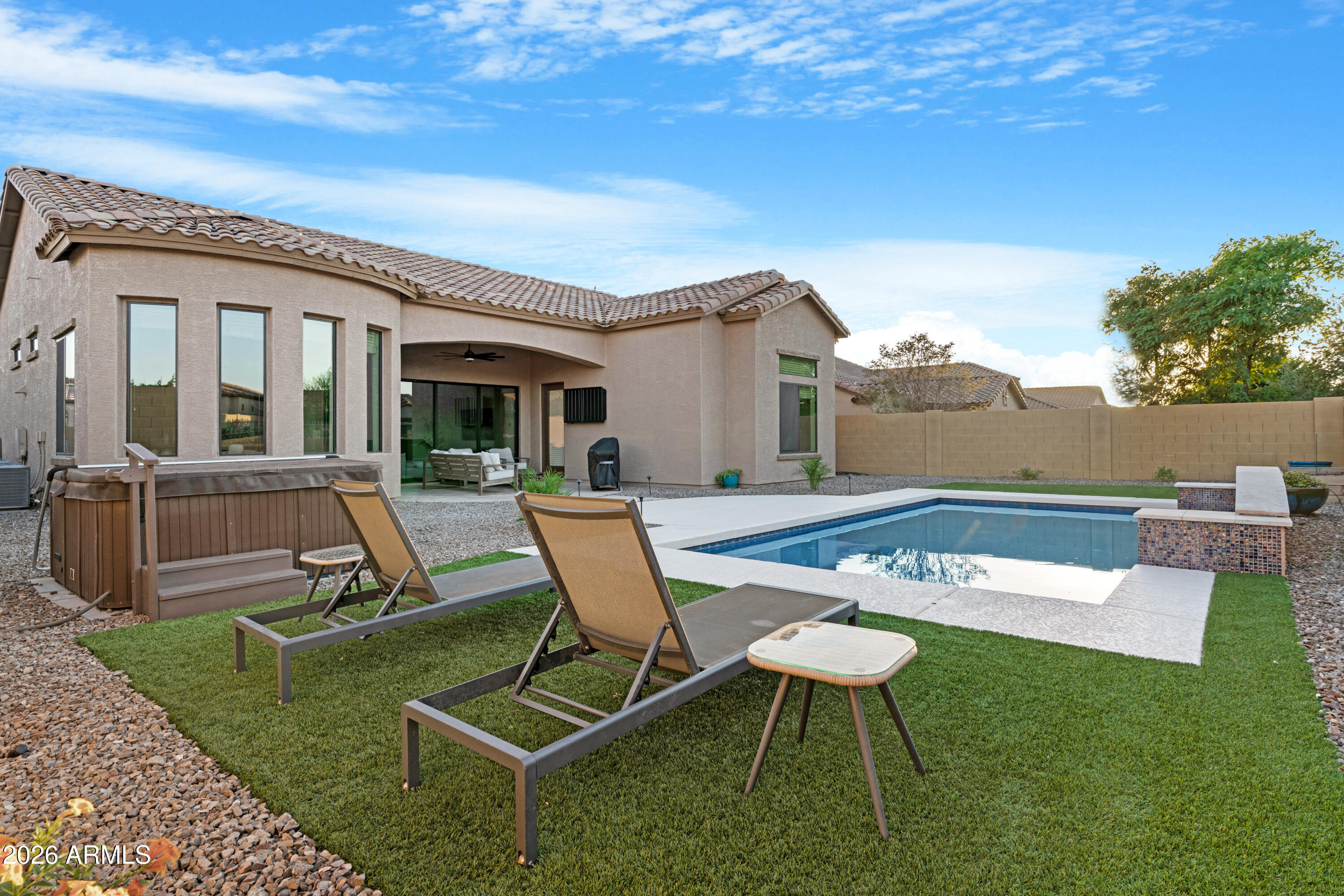 Stunning, upgraded 4-bed, 3.5-bath home in the highly desirable Mountain Bridge community of Northeast Mesa! With 2,690 sqft, this move-in ready home features a beautifully renovated kitchen, fresh interior paint, updated lighting, and modern plumbing fixtures throughout. The open, airy layout offers spacious living and generous bedrooms, perfect for entertaining or relaxing. Step outside to your private backyard oasis with a pool and spa. Enjoy resort-style community amenities including a clubhouse, pool, fitness center, tennis courts, and scenic trails. Located near top schools, shopping, and dining--this is Arizona living at its best!