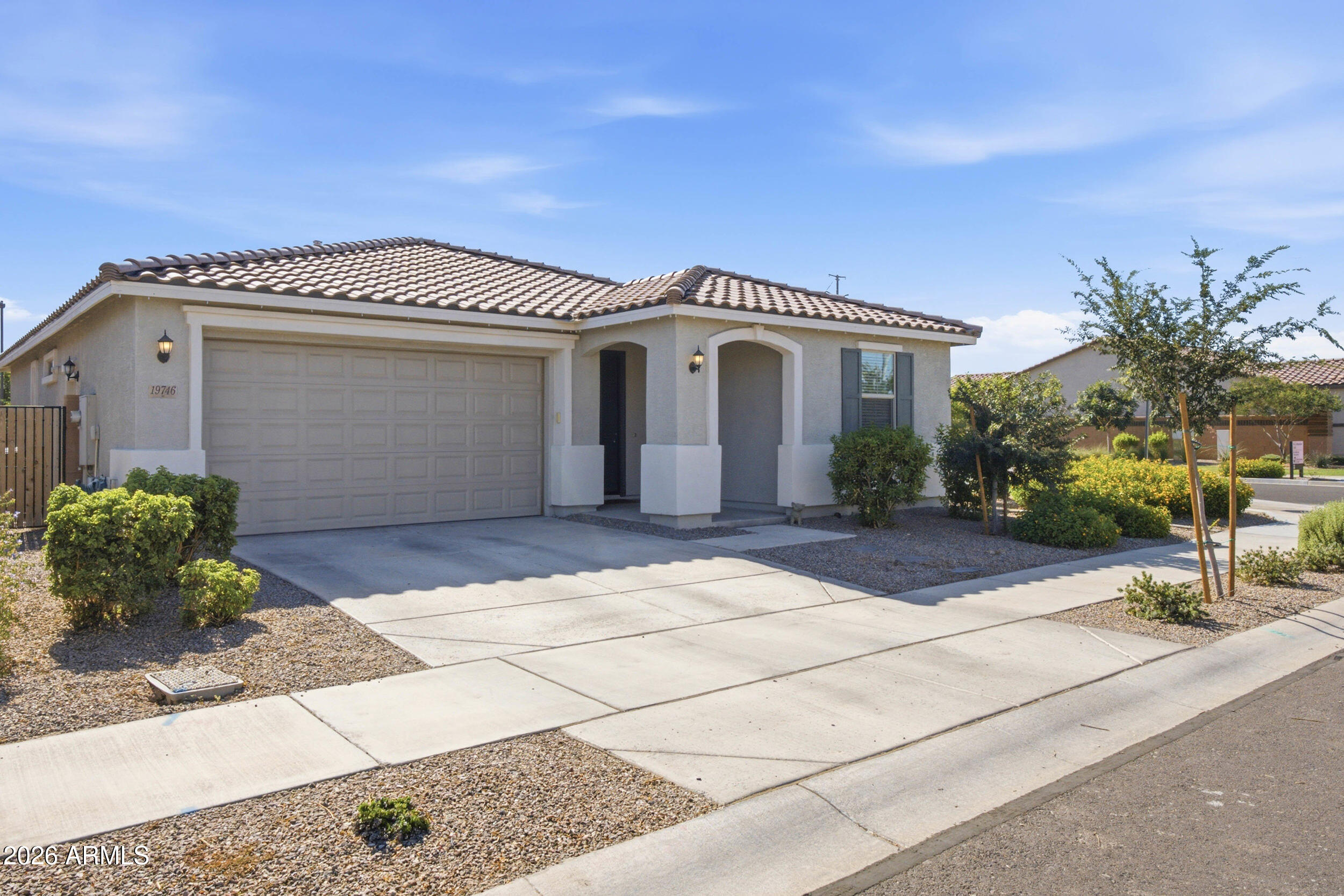 Like NEW Construction - Private Corner Lot - This 3 Bed 2 Bath Single Level Home Features Open Floor Plan with Split Bedroom Layout, Vinyl Plank Flooring Throughout Living Area, Spacious Great Room and Covered Patio Leading to Large Backyard with Natural Grass! Kitchen Features Granite Countertops, Stainless Steel Appliances, Pantry and Island Open to Great Room. Primary Suite Has Walk-In Shower, Dual Sink Vanity and Walk-In Closet. 2 Guest Bedrooms Share Full Bathroom with Shower-Tub Combo. Additional Features: 2-Car Garage, Laundry Room, Tankless Water Heater, Energy Efficient Windows, WIFI Thermostat, Storage - Low Maintenance Living! Location, Location, Location - Near Queen Creek's Top Entertainment, Dining, Shopping, Schools + Community Playground, Picnic Areas & BBQ!