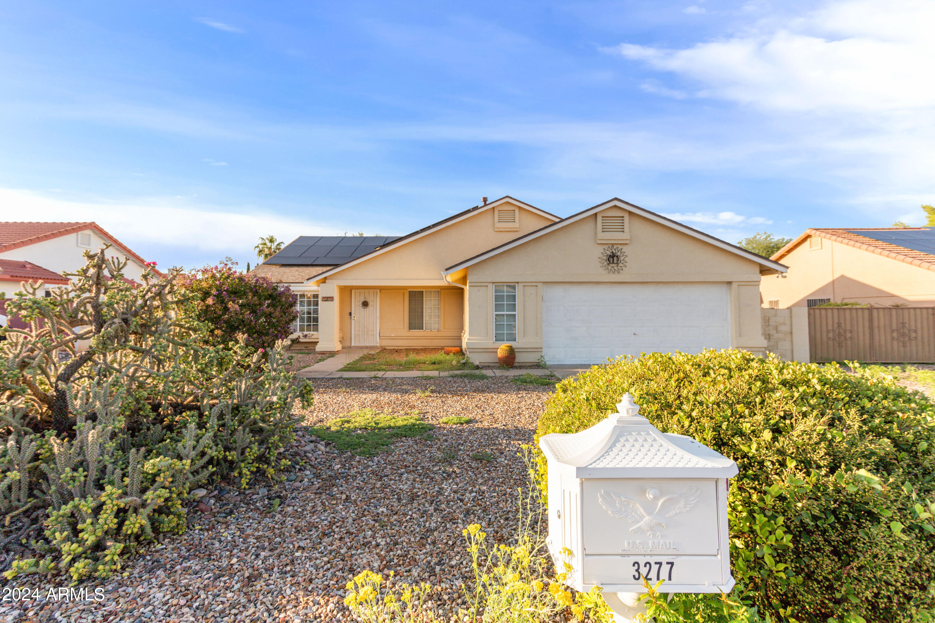This spacious 3BR/2BA/2.5CG, 1923 sq.ft. home is in the very desirable Country Club Estates in Sierra Vista, AZ minutes from Fort Huachuca, shopping, schools and Canyon Vista Medical Center.   You will love this open floor plan and all the natural light this home has to offer.  You can cozy up to the gas-log fireplace in the large great room with vaulted ceilings.  The home includes a large backyard with covered patio that is perfect for entertaining and also includes a storage shed.  This home sits on a large .267 acre lot which includes an RV gate perfect for the toys.  Newer (2022) Roof! Seller is willing to pay off solar with a full price offer!