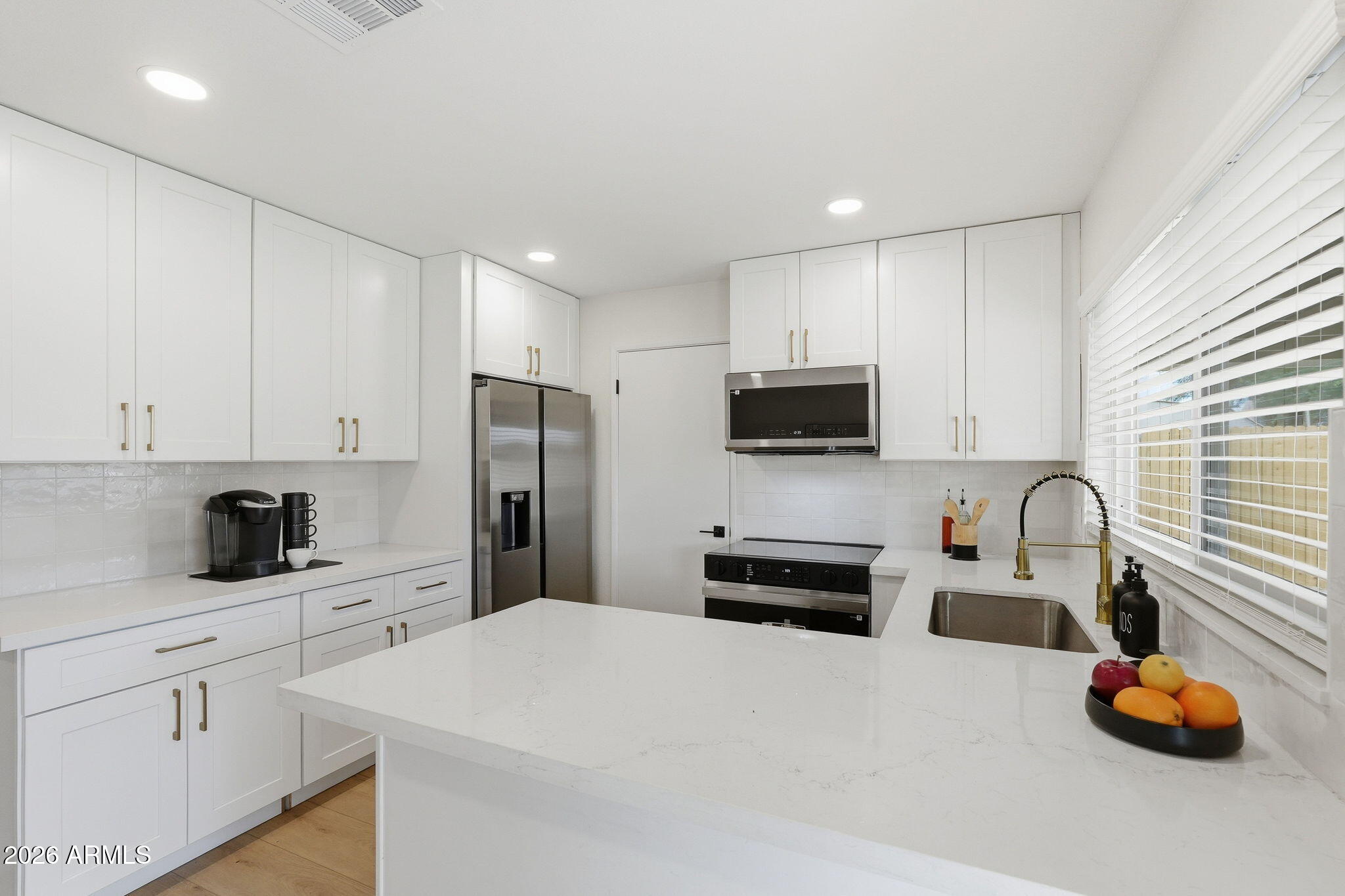 Beautifully renovated 3-bedroom, 2-bath home in a prime Chandler location! Just minutes from Chandler Fashion Center, you'll enjoy incredible shopping, top-rated restaurants, entertainment, and convenient freeway access for easy travel throughout the Valley. This move-in ready home features brand new flooring, white shaker cabinets, quartz countertops, beautifully tiled bathrooms, brand new windows, and new appliances from Spencer's. Additional upgrades include a new roof, new AC unit, fresh interior and exterior paint, plus new landscaping in both the front and backyard. Every detail has been thoughtfully updated, making this home the perfect blend of quality, style, and location!