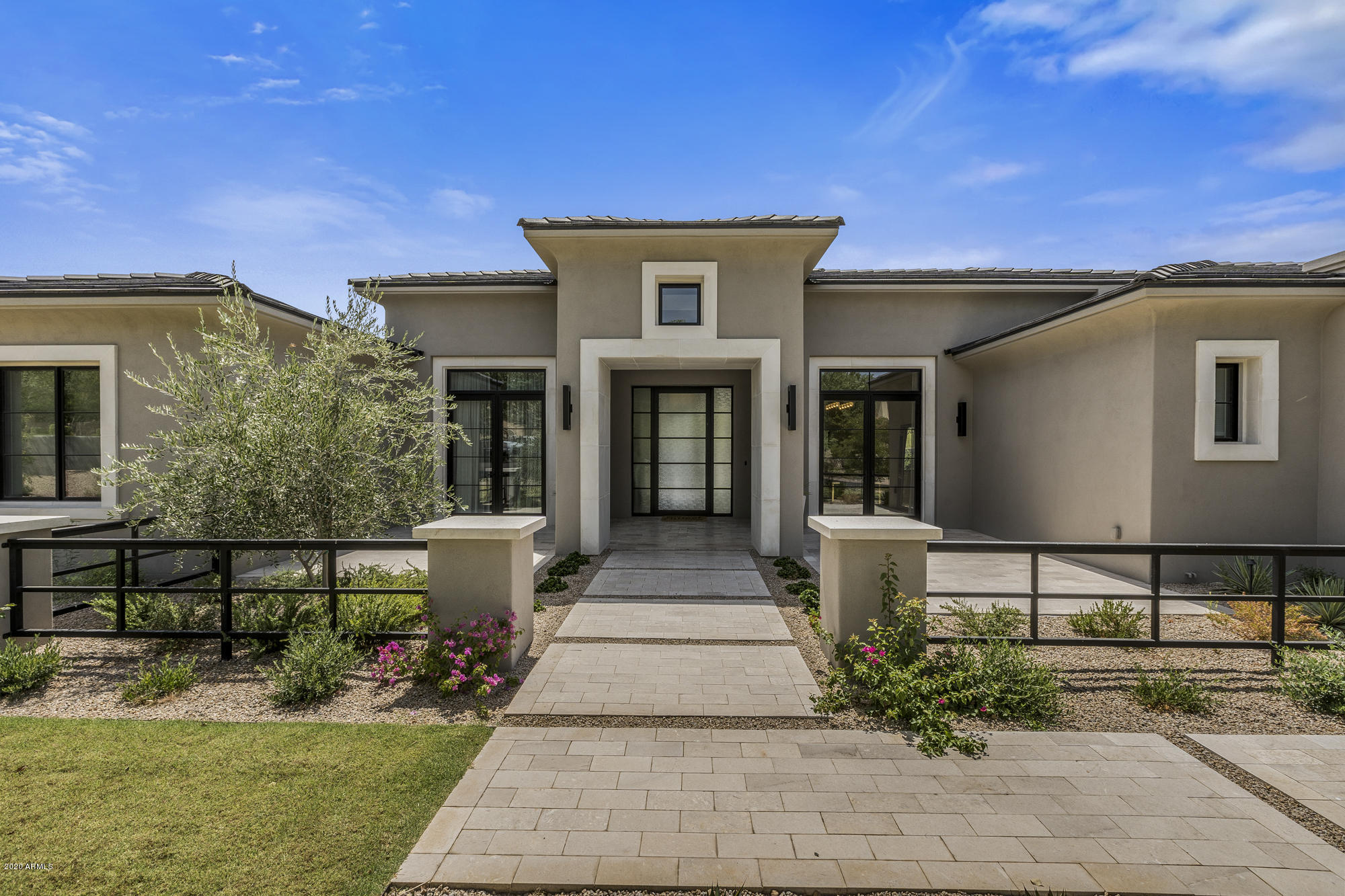 This newly built custom home is located in Silverleaf's Arcadia neighborhood and boasts gorgeous mountain views and a clean, modern style.  This 4 bedroom, 5 bath home also includes a large Office, huge Game Room, Exercise Room, Dining Room, Pantry/Back Kitchen, Breakfast Nook, and a 4-Car Garage all in a single story home.  The spacious open Great Room features a floor to ceiling tile clad fireplace and corner sliding doors extending the space into an indoor-outdoor living area.  The Kitchen has a decorative metal range hood, tile backsplash, and plenty of counter space with two islands and bar seating. A Breakfast Nook with bi-fold windows is perfect to let the breeze in while enjoying your morning coffee.  This home has a back hidden Kitchen combined with a pantry to keep messes out of the main Kitchen. A large Office space allows plenty of room to work from home comfortably.  A Game Room connecting two of the bedrooms provides plenty of space for activities.  The backyard contains a sparkling pool with water feature, built-in barbecue, and a large expanse of hassle-free artificial turf.  All main area flooring is finished with wide plank white oak wood, tile in all bathrooms, laundry, & pantry, and carpet in bedrooms.  This refined home sits on a cul-de-sac lot just a short walk from one of multiple lush green neighborhood parks.