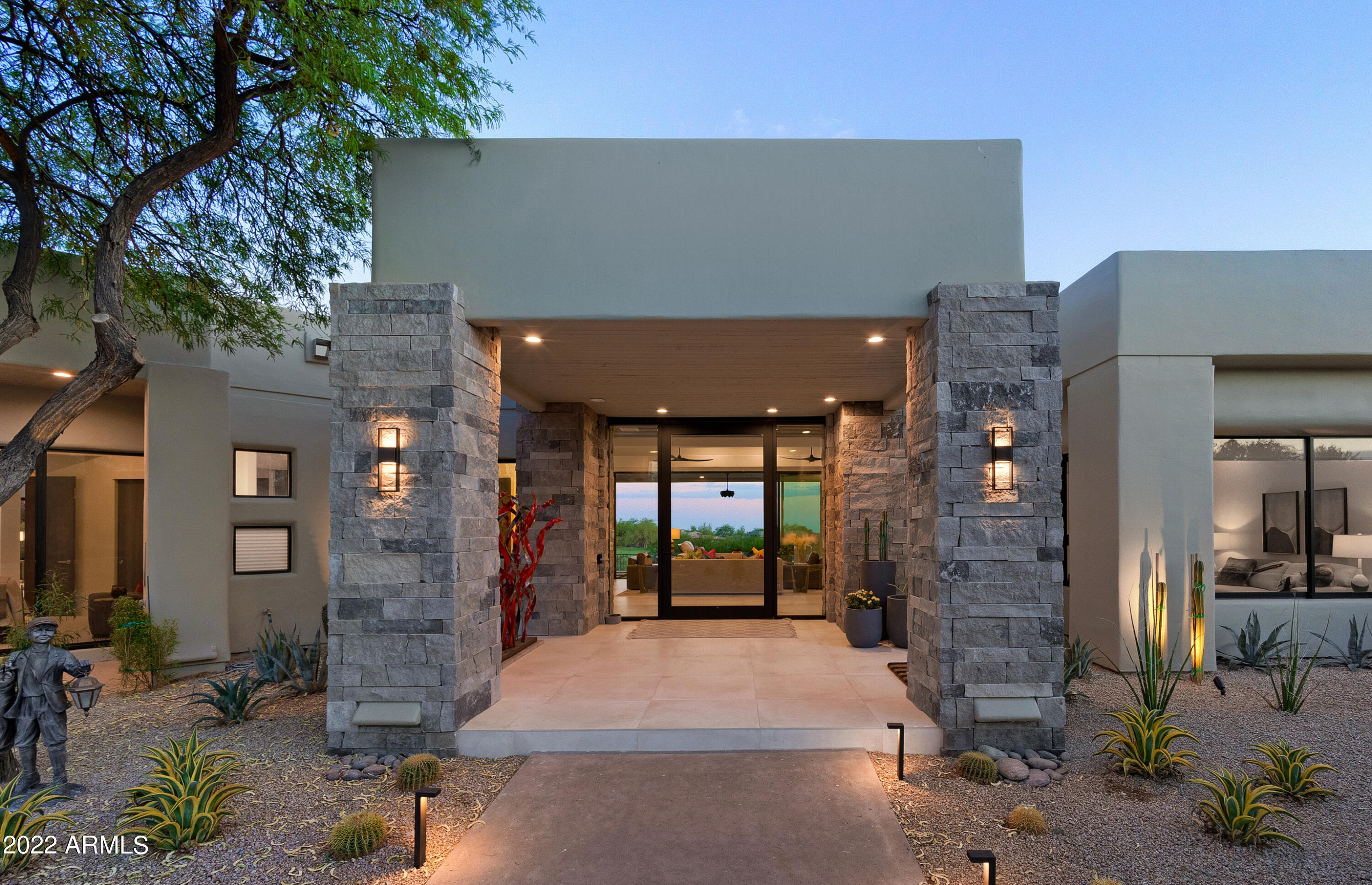 Spectacular all one level living, this completely remodeled and furnished contemporary is situated along the picturesque 6th fairway.  Floor to ceiling windows provide sunlit living throughout.  Formal living/dining with stacking doors for ideal indoor/outdoor living.  Gourmet kitchen open to the breakfast room and family room with stunning golf course and mountain views as a backdrop. 
 Primary suite with backyard access, fireplace and opulent private bath.  3 guest bedrooms, complete with ensuite baths.  Resort like backyard features a heated negative edge pool, heated spa, built-in bbq, gas firepit, expansive covered patio and upstairs viewing deck to enjoy 360 degree views! Desert Highlands, ranked as a top 100 club by Platinum Clubs of the World, offers world class amenities include a Jack Nicklaus championship golf course, 18-hole putting course, award winning clubhouse featuring Jack's Gastrupub and Jack's Backyard, bocce ball, Highlands Racquet Club offering grass and clay tennis courts + pickleball courts, state of the art fitness center & more. A $95,000 membership fee is due from buyer at close of escrow.