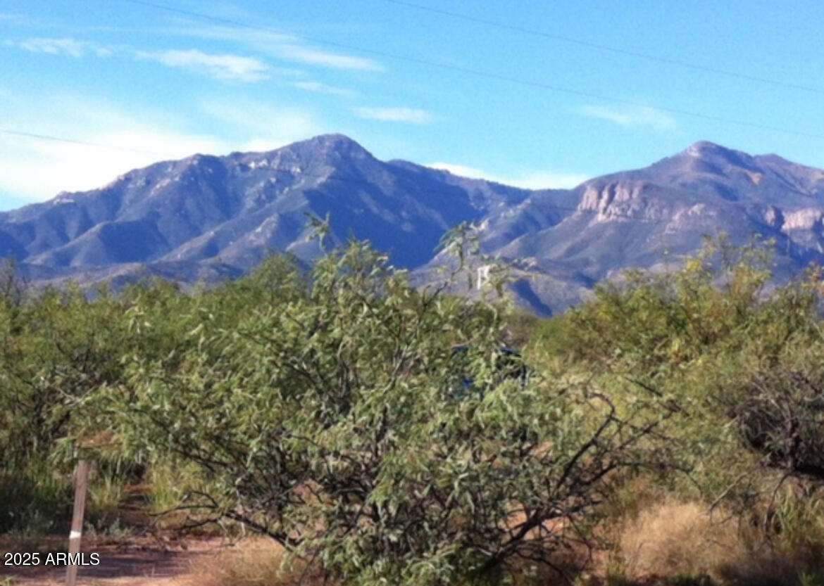 Nestled on 4.25 acres in Sierra Vista, this unique property offers the perfect blend of privacy and convenience. It features a tiny home, ready for your finishing touches, along with solar panels that have been installed but not yet hooked up—ideal for those looking to go off-grid. The property also includes a county-approved septic system, electric on-site, and access to a shared well, though no formal well agreement is currently in place. With plenty of open space and breathtaking desert views, this land offers endless possibilities for a full-time residence, vacation retreat, or investment opportunity. Don't miss out on this rare find.
