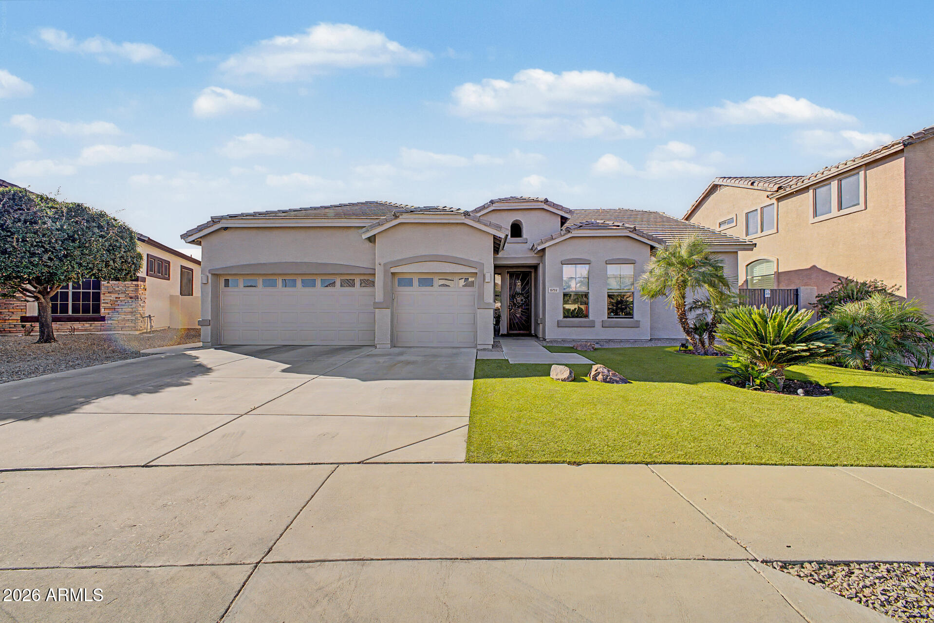 Beautiful 4 Bed/2 Bath Glendale Home with Large Premium Greenbelt Lot is for sale in the desirable Rovey Farms Estates. Minutes from Westgate Entertainment District, Cardinals Stadium, Cabelas and Desert Diamond Casino offering a multitude of activities, dining & shopping. This spacious single story home features 10' Ceilings, 4-Car Garage w/ Mini Split System and Epoxy Floor, Formal Dining or use as a Flex Room for Home Office, inviting-Open Concept Great Room w/ a Updated Gourmet Kitchen featuring Quartz Countertops, Double Stainless Steel Electric Ovens, Gas 6 Burner Cooktop and a Large Breakfast Nook. The lush low maintenance Artificial Turf front yard that stays green and inviting year round. The backyard is a DREAM! Amazing 40' Covered & Tiled Patio, Heated Pool & Tiled Outdoor Kitchen, dedicated covered BBQ area perfect for entertaining. Front and Backyard have well established plants along with 3 Fruit trees. Home is freshly painted exterior 2 months ago. Double utility gate to store the boat, kayaks & more! Both A/C Units and Gas Hot Water Heater costing over $23,000 have been replaced within the last 2 years with Parts Warranty. No Carpet, has 20" Porcelain Tiles throughout the home and Laminate Flooring in the Bedrooms and Flex Room. The Great Room, Breakfast Nook and Master Bedroom adds the "WOW"factor when you enter the Home with views of the Backyard and Pool. Minutes from the 101 Freeway. A block away from Raymond Kellis High School. This is a must see house!