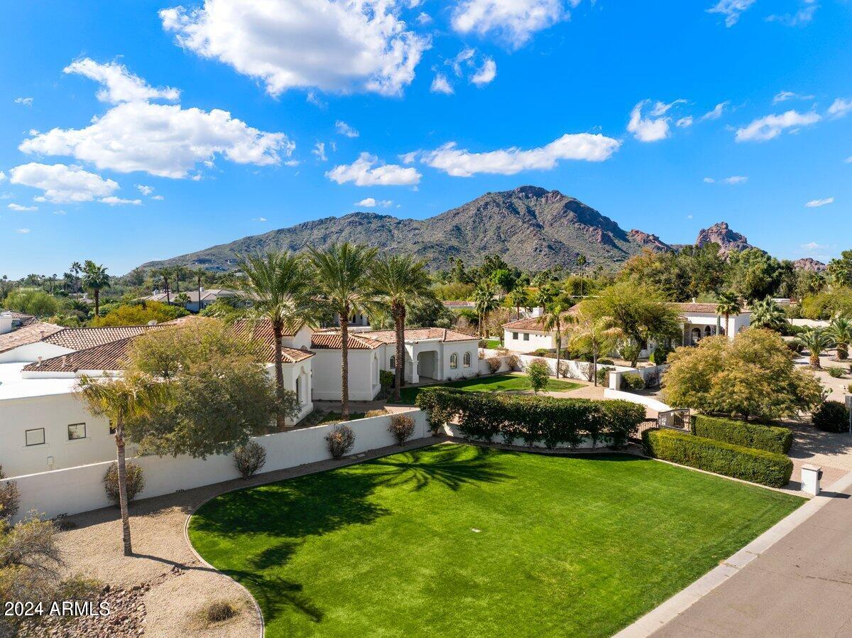 The best priced, fully remodeled home in the heart of Paradise Valley!  Breathtaking views of Camelback Mountain from this dual gated, single level estate will make you fall in love! Conveniently located near the best fine dining, designer shopping, night life, arts and entertainment. Don't miss your chance to make the stunning sunsets over Camelback your personal view every night.