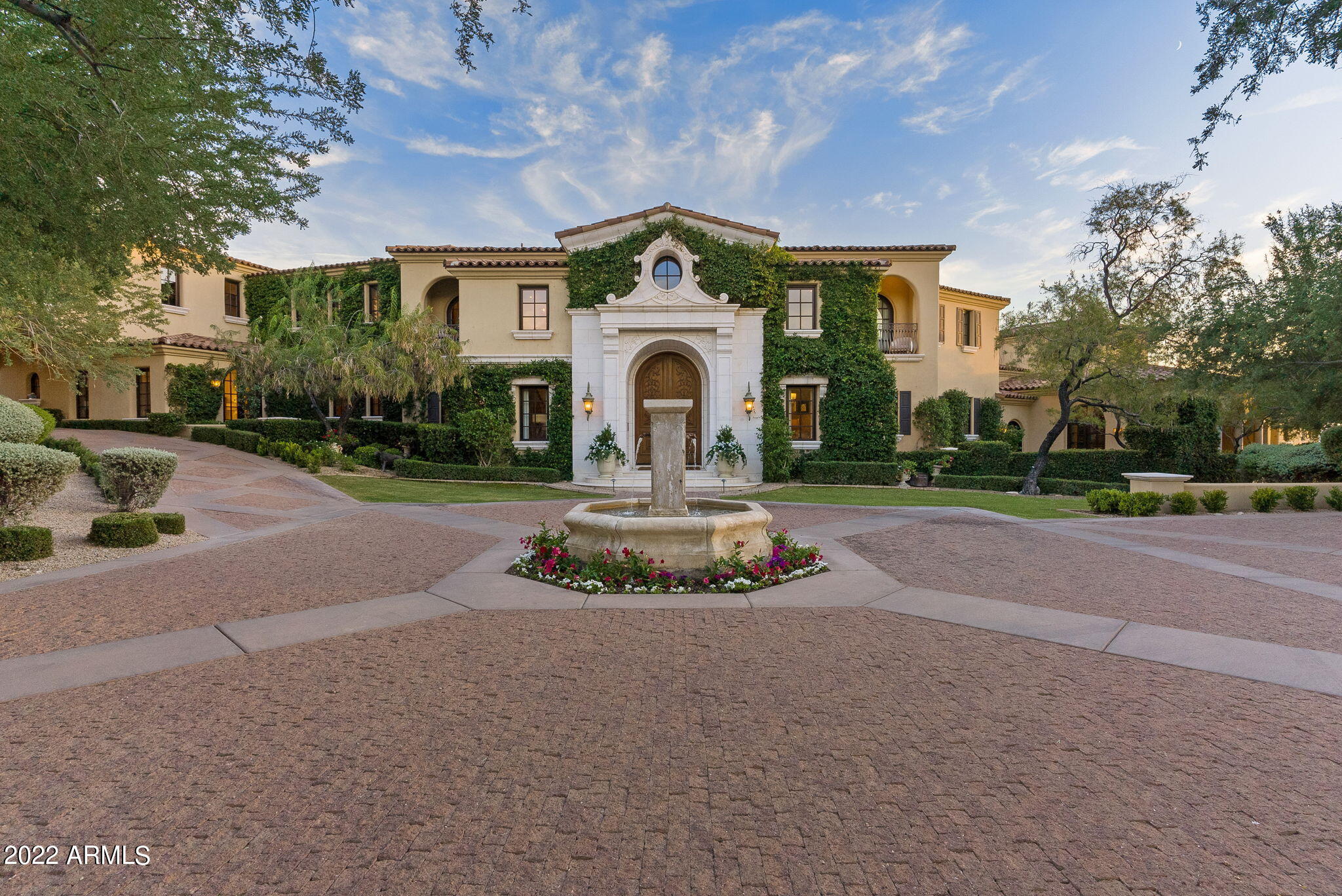WELCOME TO THE JEWEL OF SILVERLEAF. SITUATED ON 2+ ACRES THIS FRENCH INSPIRED ESTATE IS TRULY AN ENTERTAINERS DREAM. THE FOYER GREETS YOU WITH 2O+FOOT SOARING CEILINGS OPENING TO A PIANO ROOM, ELEGANT DINING ROOM AND WINE ROOM WITH OVER 1,200 BOTTLE STORAGE, THE CHEFS KITCHEN OPENS TO THE HEARTH ROOM WITH AN ATTACHED BAR. THE LAYOUT OF THIS ESTATE IS IDEAL WITH A PRIVATE OWNERS WING SEPARATED FROM THE 3 GUEST BEDROOMS AND GUEST FAMILY ROOM PLUS 7 BATHROOMS, A THEATER ROOM, ELEGANT GAME ROOM WITH BAR, PRIVATE AIR FILTERED CIGAR ROOM, AND A GOLF SIMULATOR. NO EXPENSE HAS BEEN SPARED. THE RESORT INSPIRED BACKYARD WITH POOL AND SPA OFFERS COMPLETE PRIVACY WITH AMAZING VIEWS AND A SEPARATE GUEST HOME WITH OVER 1,200 SQFT,  WHICH INCLUDES 2 BEDROOMS 2 BATHROOMS A GOURMET KITCHEN AND FAMILY ROOM