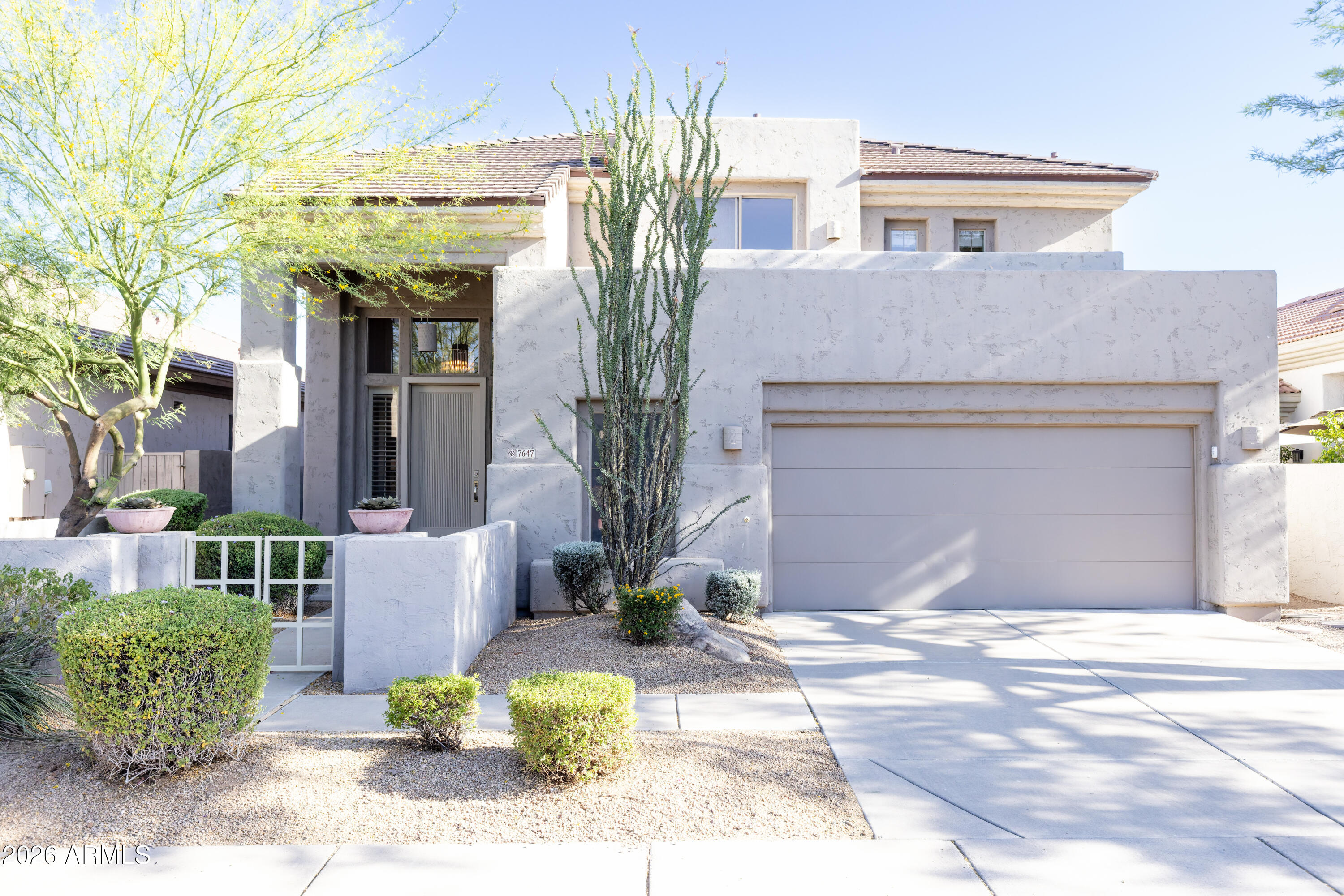 Nestled within the highly sought-after Sonoran Hills community in Scottsdale's coveted 85255 zip code, this turnkey residence represents one of the most compelling value propositions in North Scottsdale--where refined design, quality craftsmanship, and premier location converge with rare balance.
The light-filled interior has been reimagined with a curated selection of high-quality materials, including neutral porcelain tile flooring, custom finishes, and designer details throughout. A beautifully reimagined kitchen, anchored by a granite waterfall island, serves as the heart of the home, while a welcoming stone fireplace enriches the main living space with warmth and architectural character. The thoughtful layout includes one bedroom on the main level, with three additional bedrooms upstairs, complemented by three fully updated bathrooms and a seamless floor plan designed to support both refined daily living and effortless entertaining. 

Outdoors, resort-inspired living unfolds with a sparkling pool and waterfall feature, along with inviting gathering spaces that extend the home's livability into Arizona's celebrated indoor-outdoor lifestyle.

Ideally located near premier shopping, dining, golf, hiking trails, highly regarded schools, and convenient freeway access, this exceptional Sonoran Hills residence presents an outstanding opportunity to experience the very best of North Scottsdale living.
