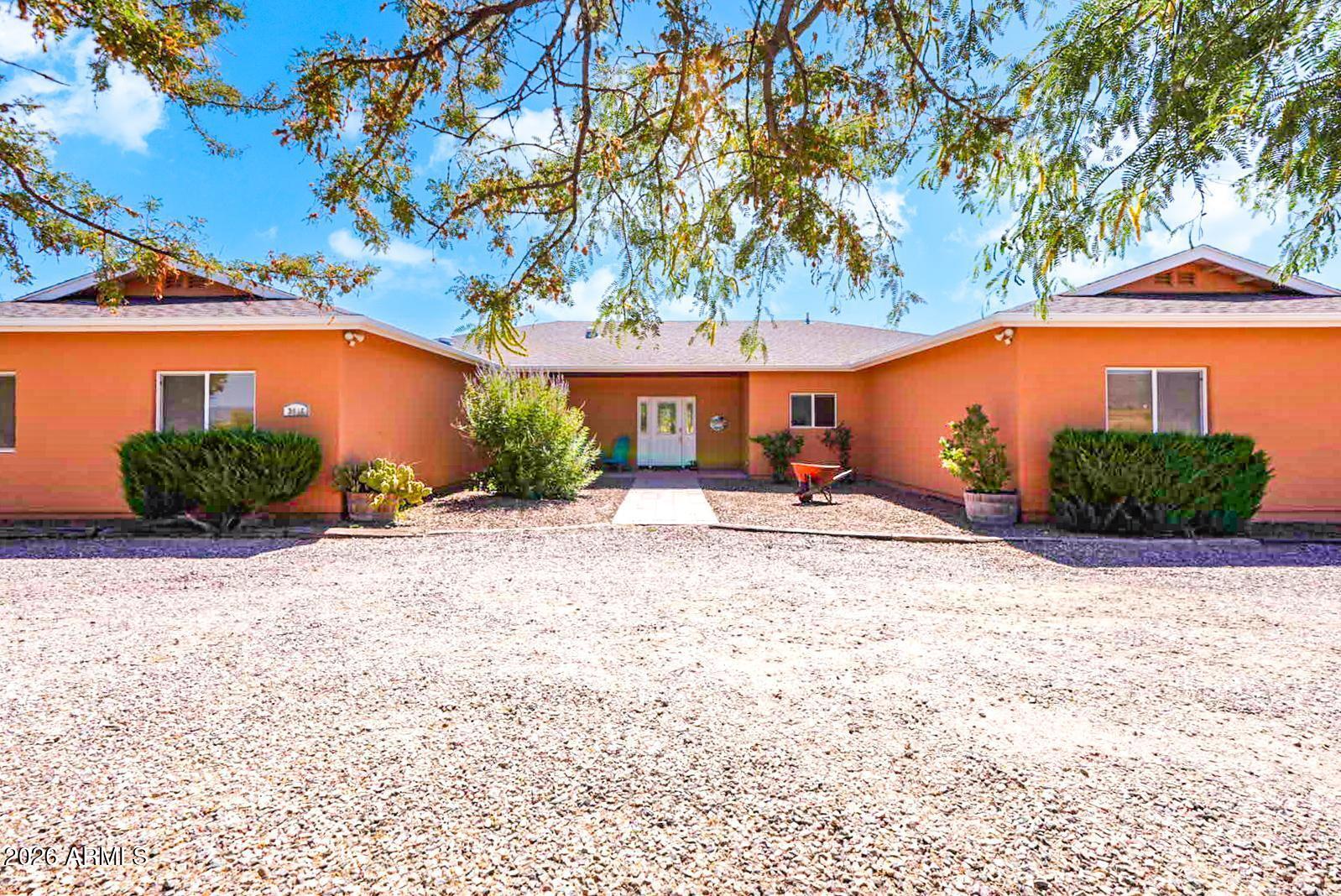 Beautiful private retreat situated on over 2 acres with plenty of room for horses, recreational vehicles, and all your outdoor toys. The park-like setting offers peace, privacy, and endless possibilities. Car enthusiasts and hobbyists will appreciate the expansive garage space, featuring over 1,000 sq. ft. of attached garage plus an additional nearly 1,000 sq. ft. detached garage/shop. Inside, you'll find a desirable split floor plan with 3 spacious bedrooms, 2.5 bathrooms, a dedicated office, and a versatile bonus room. This property offers the ideal combination of comfort, functionality, and country living while still providing modern conveniences. Enjoy the added benefit of being close to the river, perfect for outdoor recreation, fishing, and enjoying nature just minutes from your door