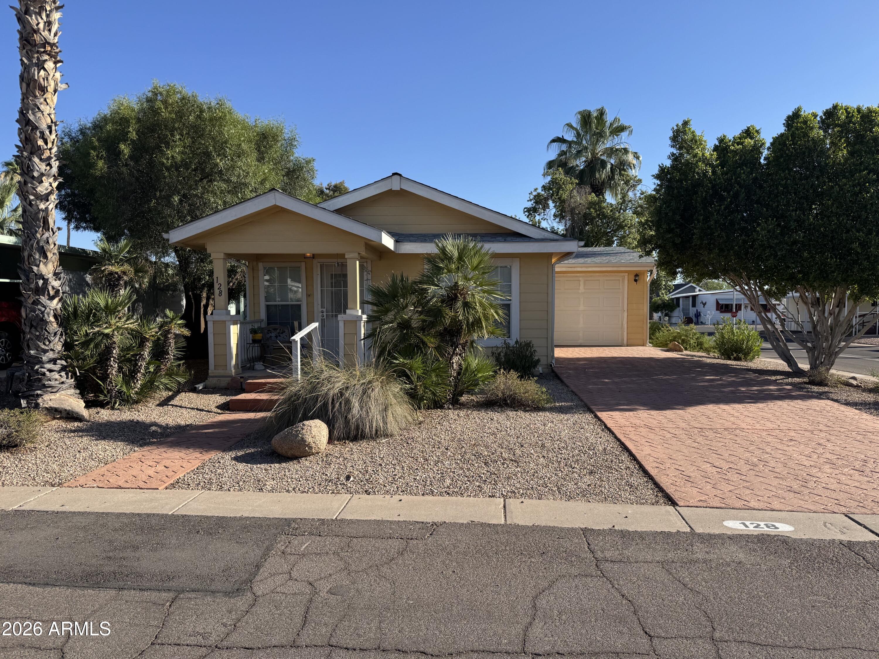 Special 2 bedroom 2 bath in a gated 55+ community. This is one of the few homes with a  garage with plenty of additional room for storage. Client loves extra safety & level entrance to home.  Walk into a good sized living room with an open floor plan! Kitchen has tile counters & BRAND new appliances stainless steel. Plenty of cabinet space for all your pots and pans. Inside laundry room With Built in Cabinets. 2nd bedroom is very spacious. Guest bath offers walk in shower. Master has a large walk in closet. Linen or coat closet also in bedroom. Entering the bathroom you will find dual sinks with tub and shower. Enjoy the front porch seeing Az Sunsets. Park offers amenities with pool, spa, activities & Dog park. 1/2 block to Clubhouse! Plumbing has been redone along with AC duct work.