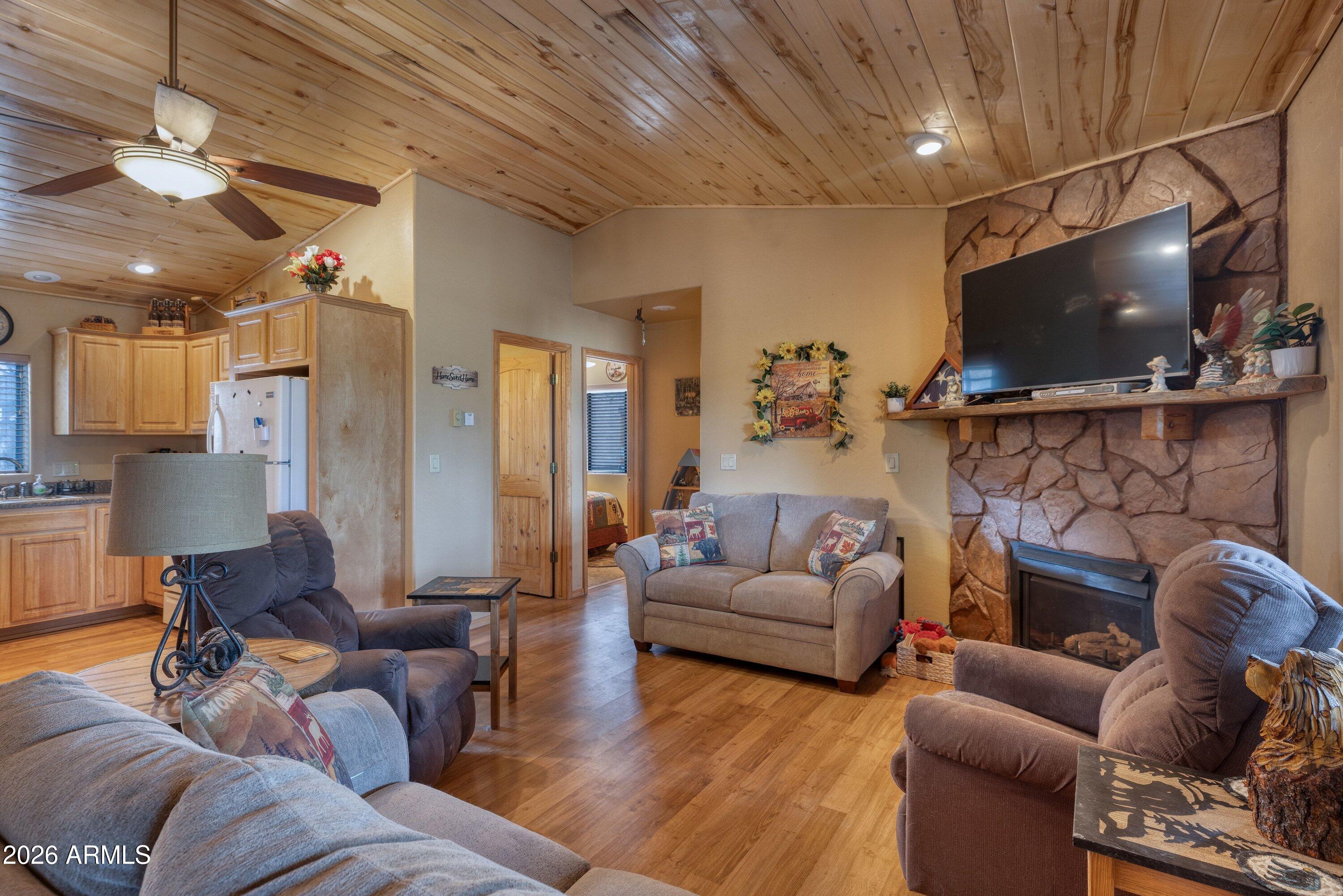 3524 Buckskin Rd, Overgaard, AZ 85933--

Cooler temperatures, quiet mornings, and the scent of pine set the tone for this welcoming cabin-style retreat in Overgaard.

3524 Buckskin Rd is a quintessential White Mountain cabin experience--a comfortable 3-bedroom home set on a spacious, tree-filled lot that captures exactly what buyers come to this area for: peaceful mountain living, privacy, and a true escape from the desert heat. All of this, just about 2.5 hours from the Phoenix metro area, makes it an ideal and highly accessible getaway when you need a break from the valley. Whether you're searching for a weekend retreat, a summer escape, or a property with future income potential, this home offers the flexibility to fit a variety of lifestyles and long-term goals.

Outdoor living is a highlight here, with a covered space that naturally extends your living area into the forest setting. It's the kind of place where mornings begin slowly with coffee under the pines and evenings end in quiet relaxation, surrounded by nature.

Inside, the home offers a warm, spacious and functional layout with three bedrooms that comfortably accommodate family and guests. The footprint is intentionally manageable, making it easy to maintain while still providing everything needed for seasonal or full-time mountain living.

For those considering investment potential, Heber-Overgaard continues to see strong demand for short-term and seasonal rentals, driven largely by Phoenix-area buyers seeking cooler temperatures and outdoor recreation opportunities.

Located in the heart of the White Mountains, you're just minutes from national forest access, trails, and year-round activities including hiking, off-roading, fishing, and seasonal adventures.

This is a property that supports multiple paths forward--personal retreat, investment opportunity, or a combination of both. Simple, flexible, and rooted in one of Arizona's most desirable mountain communities, it delivers a lifestyle that remains in consistently high demand.