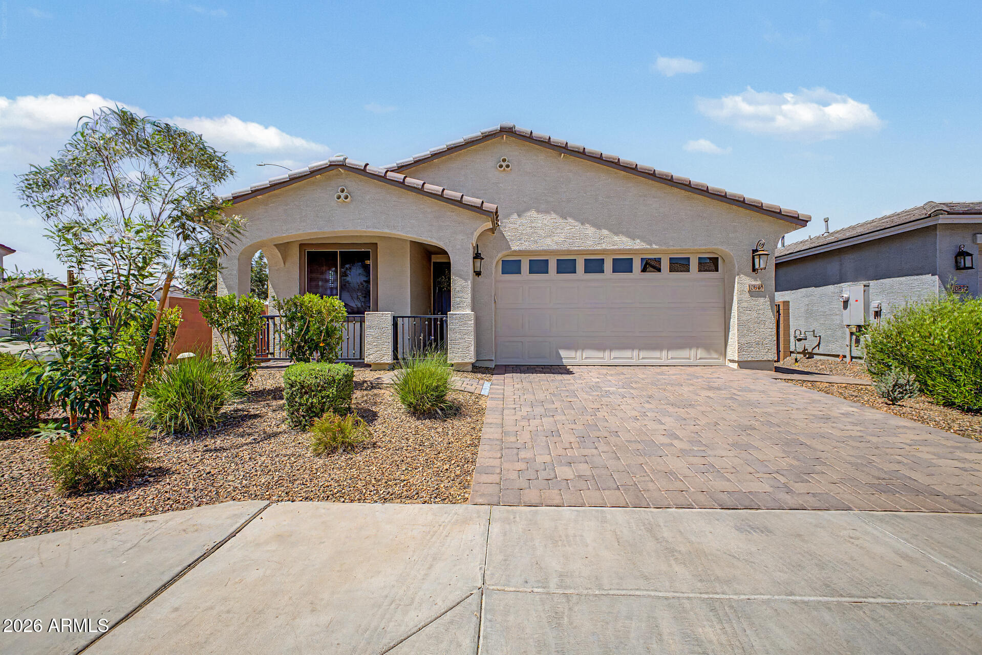 Why wait for new construction when you can have it all now? Premium N/S facing corner lot in La Mira, this beautifully upgraded single story home offers modern living & a lightly lived-in feel. Featuring 5 beds & 3 baths, the open layout includes 9' ceilings, upgraded flooring, tray ceiling in primary, & electric fireplace accent wall. Kitchen offers granite, GE appliances & RO system. Extensive upgrades include solar, epoxy garage, built-in speakers, EV-ready 220V garage outlet, tankless water heater, smart features & garage cabinetry. Backyard features citrus trees & is prewired for gas grill, outdoor fireplace & spa. Minutes to AZ Athletic Grounds, ASU Poly, Gateway Airport, hospitals, shopping & freeways. HOA amenities include pool, walking path & playground, plus nearby hiking & golf.