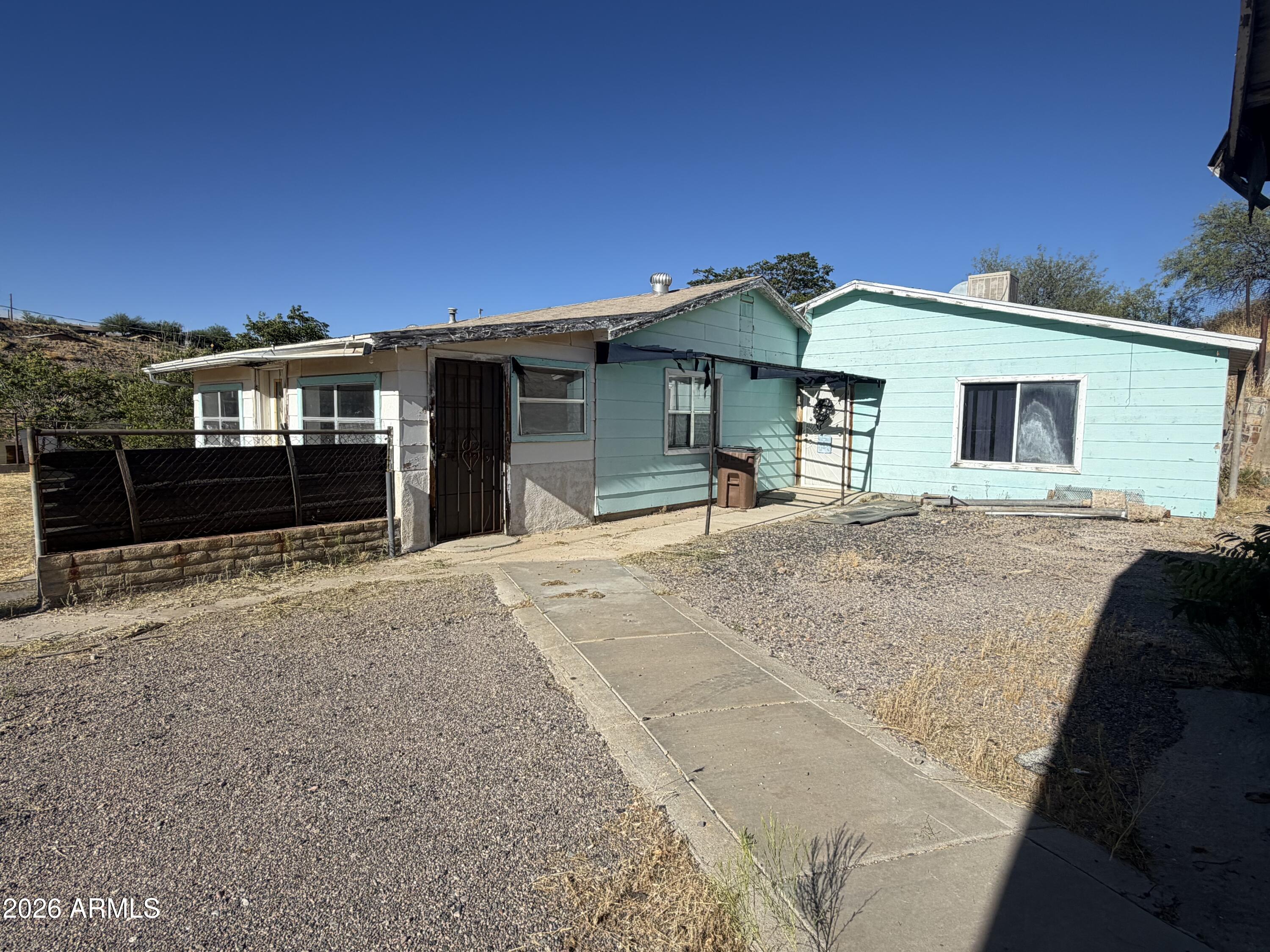 This property has so much to offer! Featuring two homes and a detached 30' x 30' shop, this unique property provides flexibility for multi-generational living, guests, rental income, or a home-based business. The primary residence offers 2 bedrooms and 2 bathrooms, while the guest home includes 1 bedroom and 1 bathroom with additional space that could potentially accommodate a second bedroom. Enjoy a desirable location with beautiful mountain views and plenty of room to spread out. Seller financing may be available. Don't miss this opportunity--view the home today!