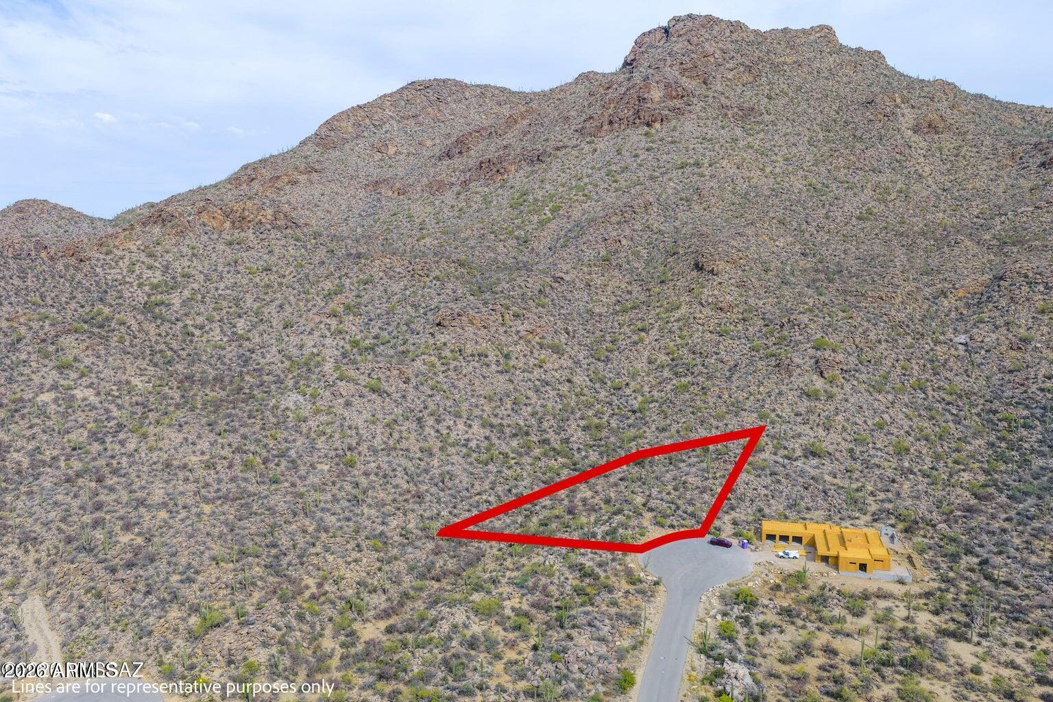 Build your custom dream home on this 1.04-acre homesite within the prestigious guard-gated community of Saguaro Ranch. Located in the desirable Moonlight Canyon district, this property offers stunning Tortolita Mountain views, privacy, and a beautiful Sonoran Desert setting. Enter through Saguaro Ranch's iconic tunnel entrance and experience one of Southern Arizona's premier luxury communities, ideally situated between Dove Mountain and Stone Canyon. Enjoy easy access to world-class golf, hiking, dining, and outdoor recreation while creating a one-of-a-kind desert retreat.