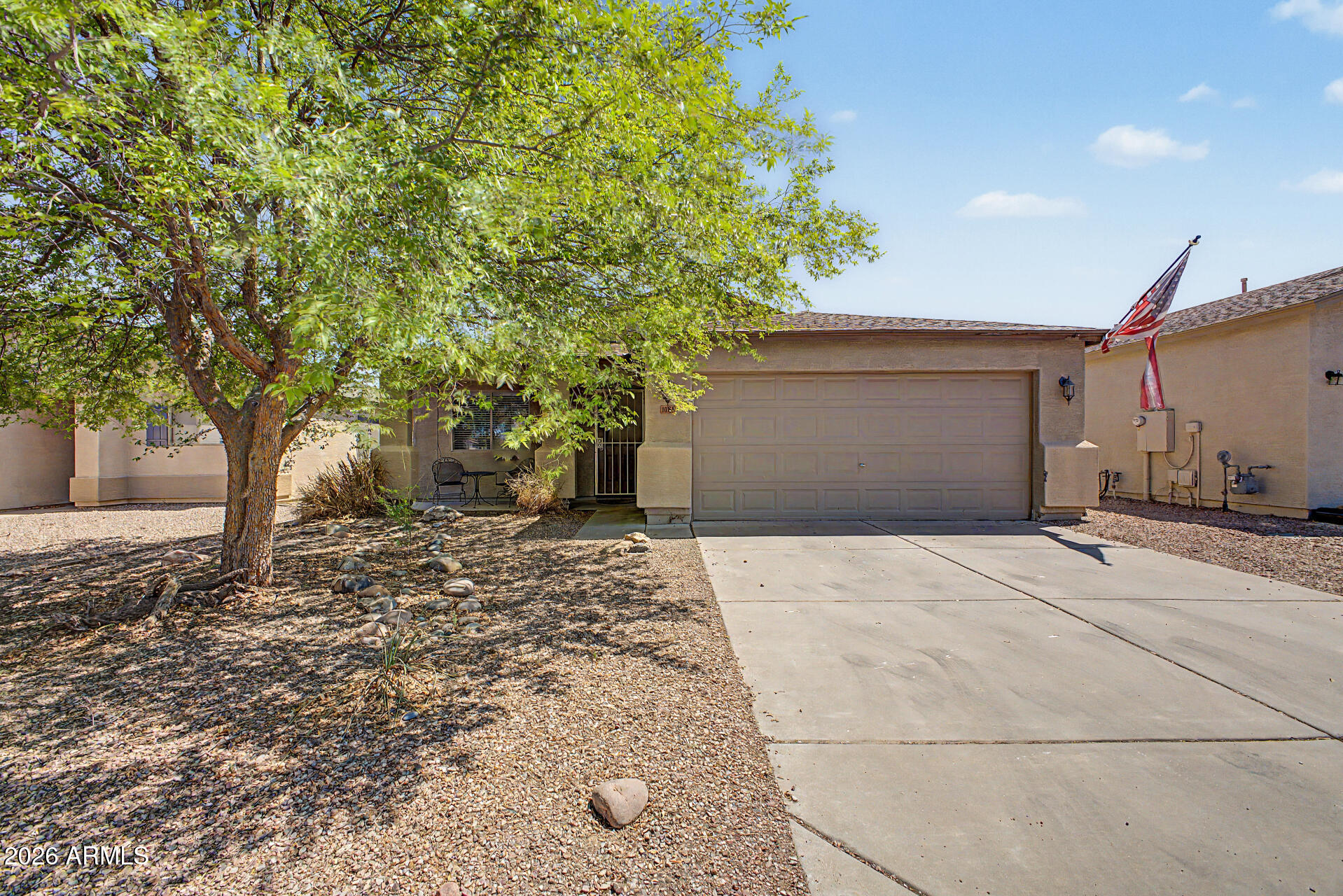 Look no further! This charming 2-bedroom, 2-bath home in the highly sought-after Johnson Ranch community is ready to impress. From the low-maintenance landscaping and inviting front porch to the 2-car garage with built-in cabinetry, every detail has been thoughtfully designed for comfortable living.

Step inside to discover a bright and airy open floor plan filled with natural light, designer finishes, and a seamless blend of tile and wood-look flooring throughout. The inviting eat-in kitchen features stainless steel appliances, granite countertops, rich wood cabinetry, and sliding glass doors leading to the backyard for easy indoor-outdoor living.

The spacious primary suite offers a private retreat complete with a dual-sink granite vanity and en-suite bath. Out back, enjoy your own personal oasis featuring a covered patio, beautifully laid flagstone, storage shed, and a relaxing hot tub tucked beneath the gazebo -- perfect for entertaining or unwinding at the end of the day.

Easy access to Hunt Hwy for getting anywhere you want to go. Minutes to Mesa gateway for long distance travel! Don't miss this incredible opportunity to own a move-in-ready home or home away from home with charm, style, and exceptional outdoor living!"
