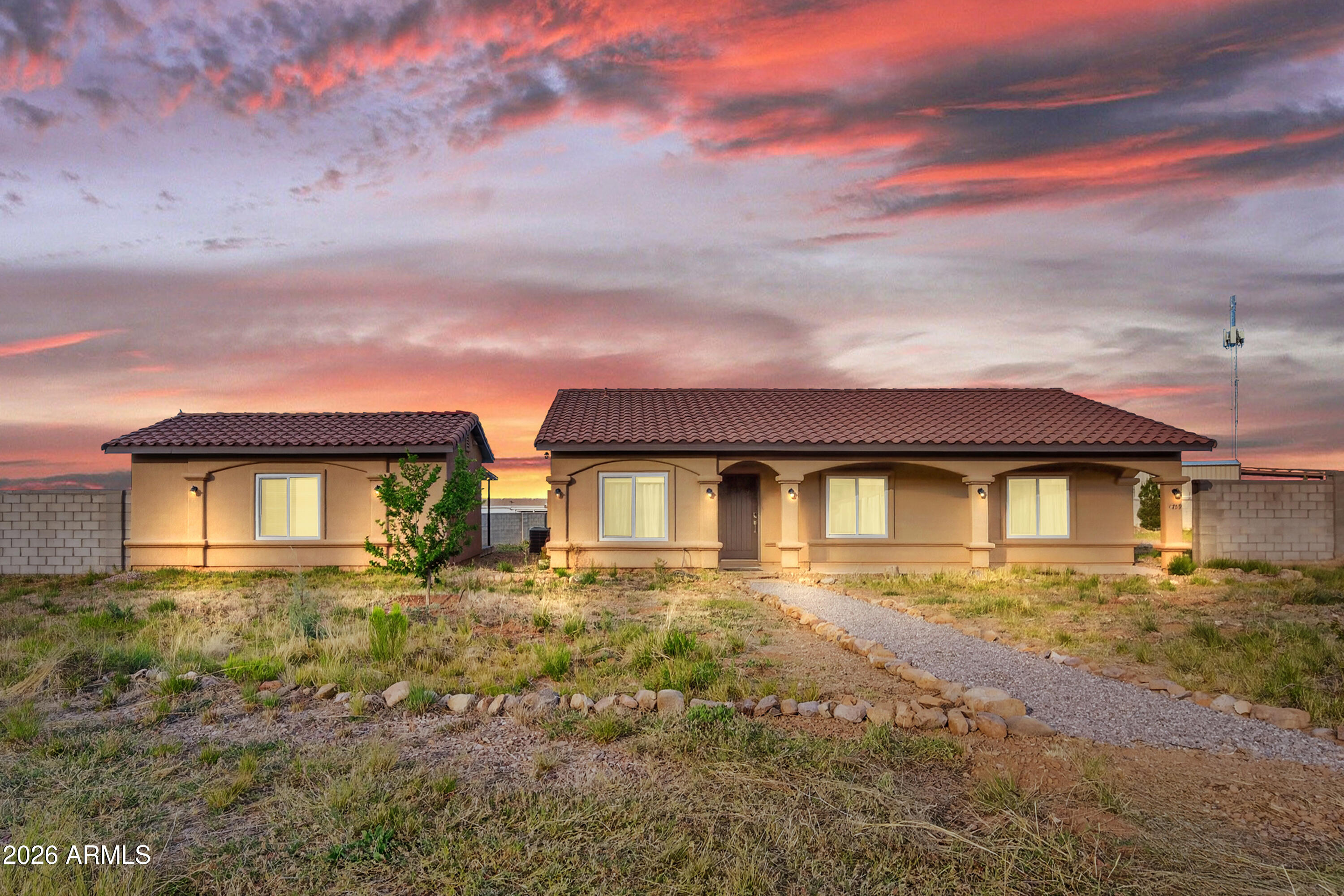 Beautifully built country home featuring a separate studio guest house and truly spectacular VIEWS! This property offers peaceful rural living with breathtaking views of the Huachuca Mountains while still providing convenient access to Hwy 92 and Hereford Rd. for an easy trip to town.

The main home includes an extra-large matching storage shed and a fully fenced backyard is perfect for animals. The studio guest house comes equipped with appliances, making it ideal for guests, rental potential, or multi-generational living.

The property is beautifully enhanced by mature trees and blooming rose bushes, creating a serene and inviting atmosphere.

This is a must-see property that perfectly blends comfort, functionality, and stunning natural surroundings!