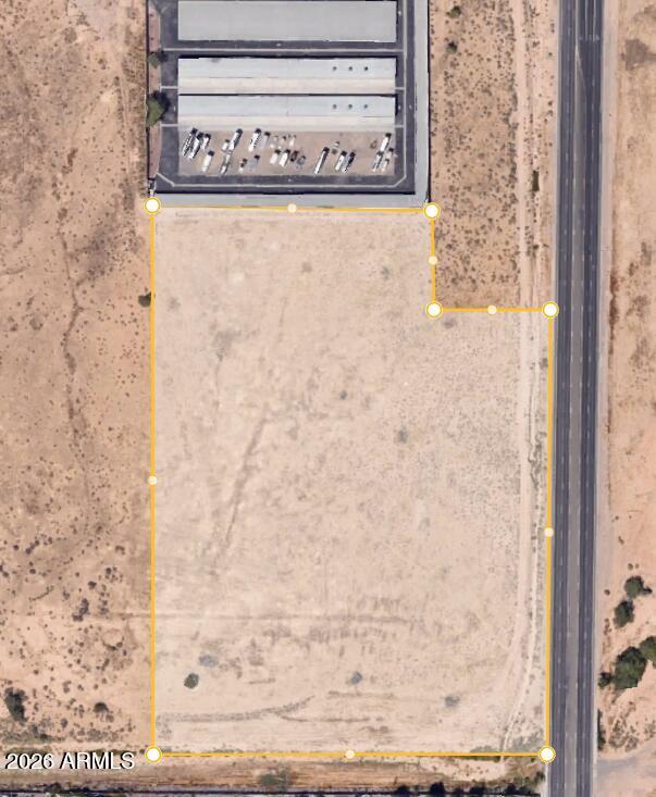 Prime 10.8-acre commercial parcel located at the corner of Trekell Road and Rodeo. Flat, usable land with excellent visibility and access. Suitable for a variety of commercial uses including retail, industrial, storage, or service-based development. Ample space for parking, multiple structures, and future expansion. Rare large-acreage commercial opportunity with strong development potential.