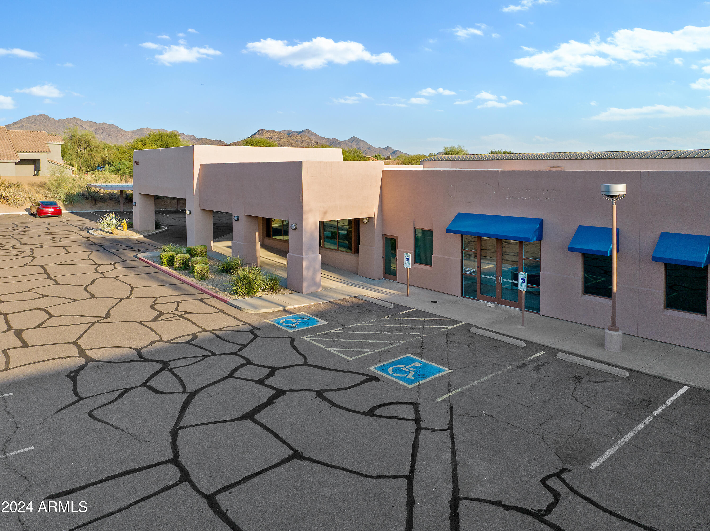 DESERT VILLAGE SHOPPING CENTER - Commercial Sale