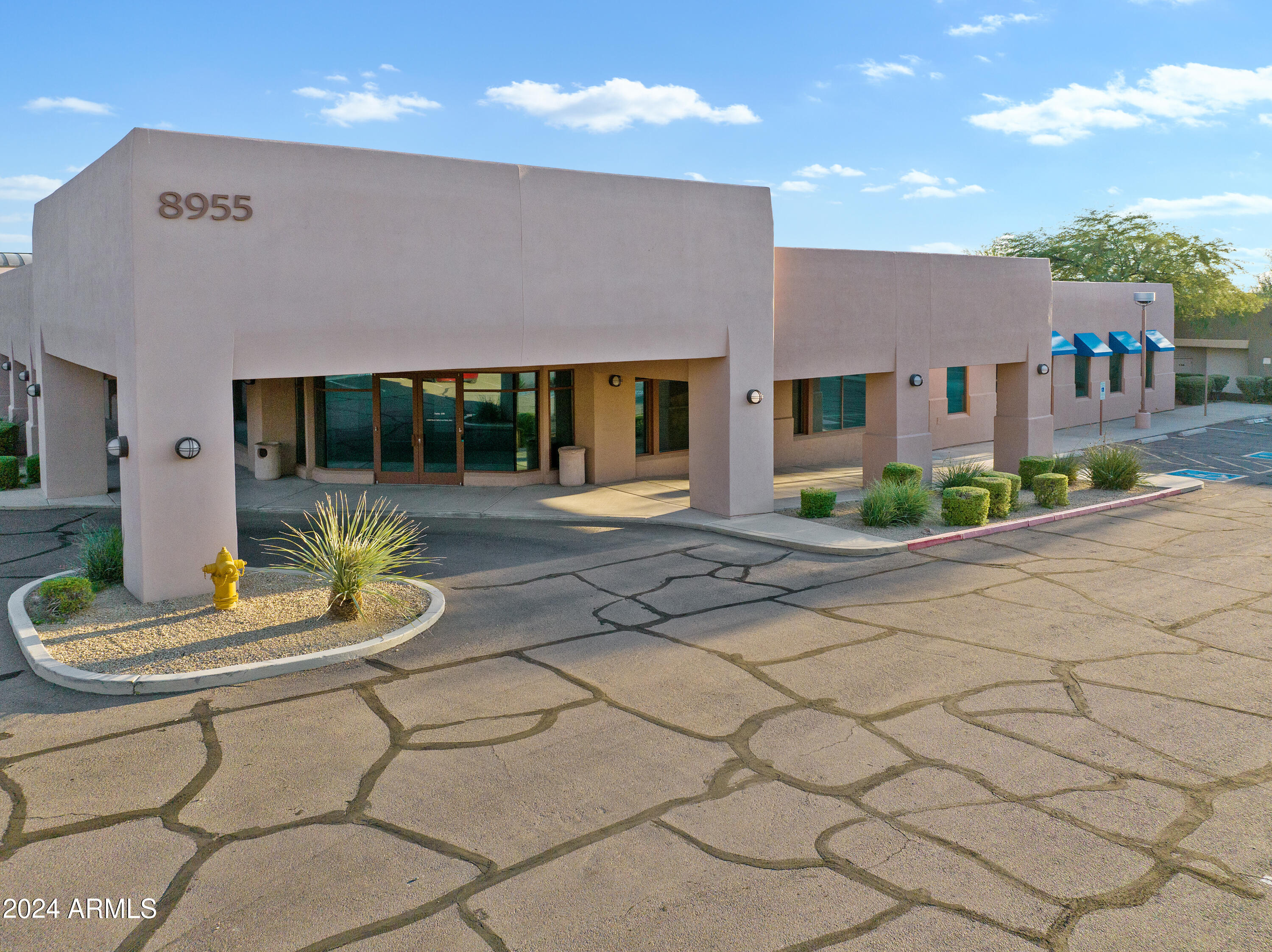 DESERT VILLAGE SHOPPING CENTER - Commercial Sale