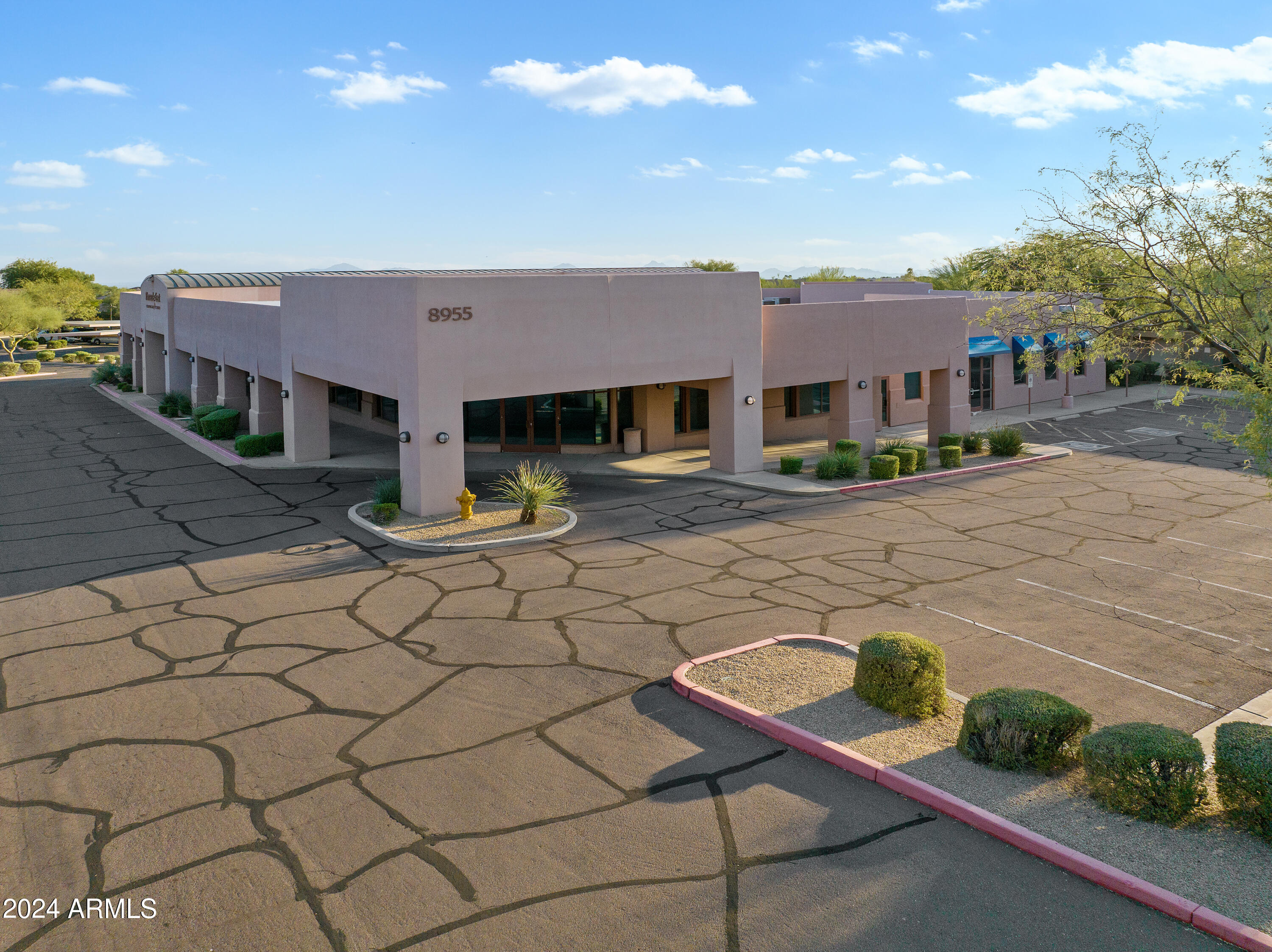 DESERT VILLAGE SHOPPING CENTER - Commercial Sale