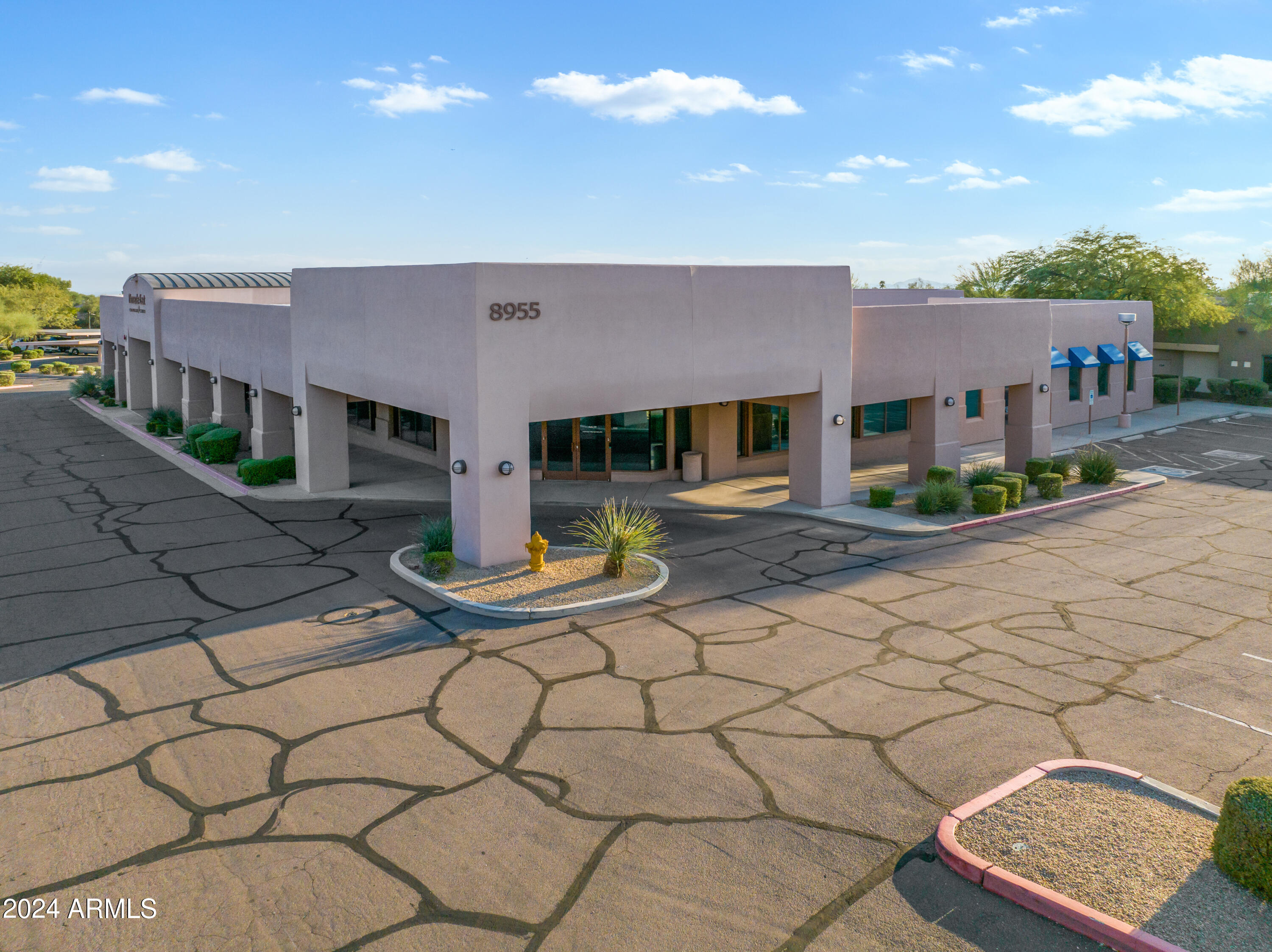 DESERT VILLAGE SHOPPING CENTER - Commercial Sale