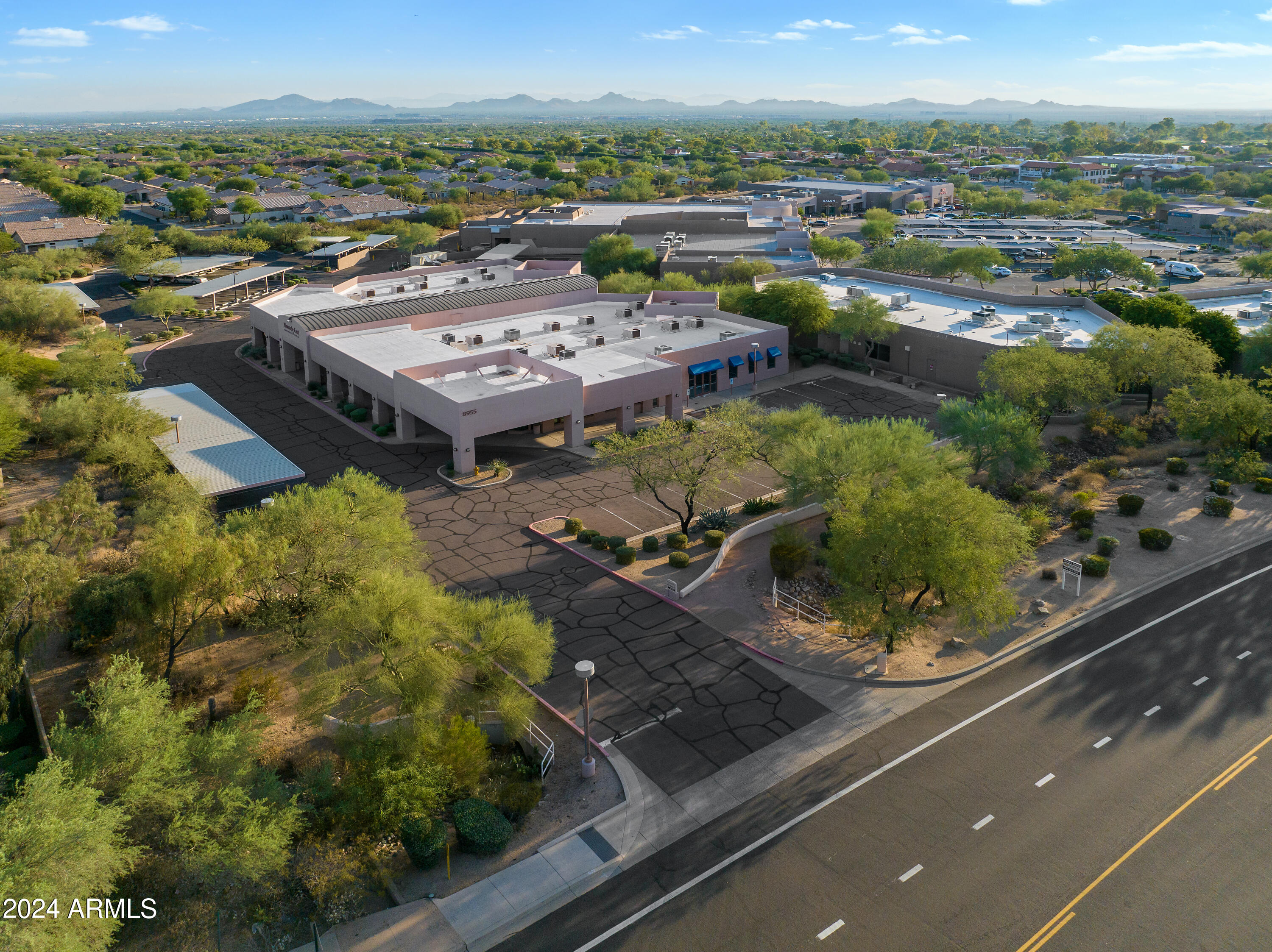 DESERT VILLAGE SHOPPING CENTER - Commercial Sale