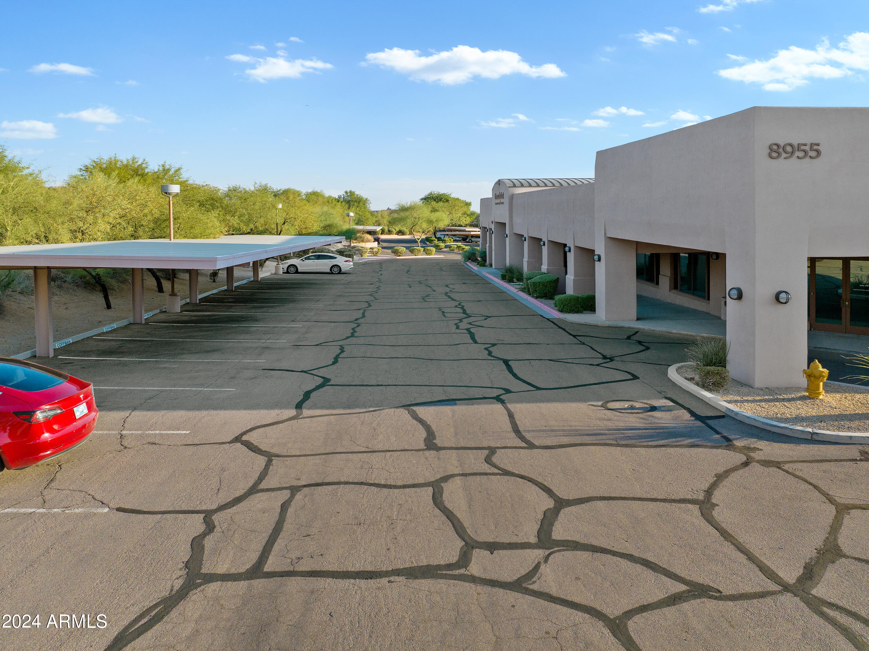 DESERT VILLAGE SHOPPING CENTER - Commercial Sale