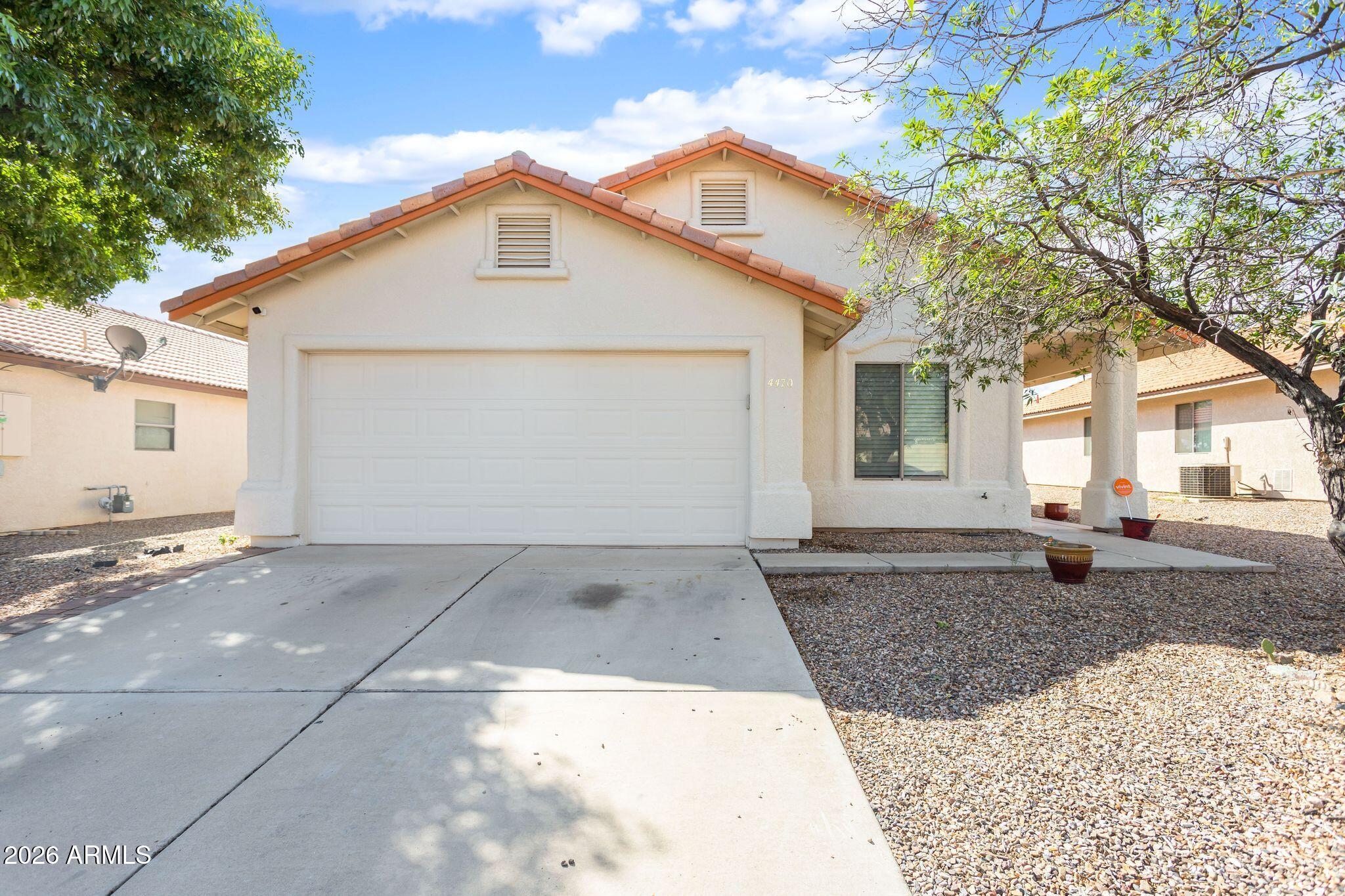 Enjoy breathtaking mountain views from this spacious 4-bedroom, 2-bath home conveniently located in town! Features include a large living room, eat-in kitchen with pantry, and tile plus wood laminate flooring throughout NO carpet. The oversized primary suite offers a full private bath. The versatile 4th bedroom at the front of the home is perfect for an office, den, gaming room, or guest space. Step outside to the back patio and take in unobstructed mountain views with no neighbors behind you. The perfect place to relax and unwind. Don't miss your chance to make this home yours!
