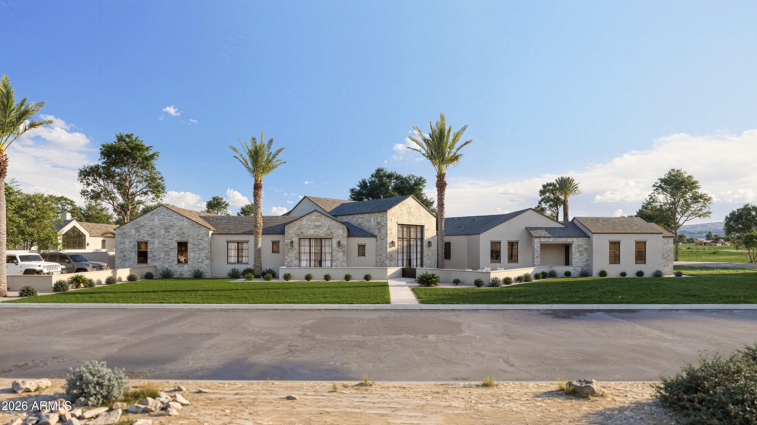 Set on a highly sought-after corner lot in the prestigious Cactus Corridor, this exceptional luxury residence offers an unparalleled blend of scale, craftsmanship, and location. Situated on just under an acre, the property encompasses 7,778 square feet total, including a 6,817 sq ft main residence and a beautifully appointed 961 sq ft guest house. The main home features 4 spacious bedrooms, a dedicated office, an expansive game room, and 5.5 bathrooms, all thoughtfully designed with luxurious finishes throughout. A 4-car air-conditioned garage tall enough for lifts provides ample space for collectors and everyday convenience alike. The private guest house offers a one-bedroom, 1-bath retreat with a large living room, perfect for visitors or extended stays. Inside, the home showcases refined, modern luxury with custom natural oak cabinetry accented by warm copper tones, Mykonos-edge profile countertops, and elegant hardwood flooring. The chef's kitchen is a true centerpiece, equipped with top-of-the-line Wolf and Sub-Zero appliances, including a built-in double oven, professional-grade coffee system, and an adjoining butler's pantry for seamless entertaining.

The outdoor living is equally striking, featuring a large patio, oversized heated pool and spa, and a large ramada, providing all the space you need to enjoy what Arizona is most known for: indoor-outdoor living!

Perfectly positioned just minutes from Scottsdale's finest dining, shopping, golf, private airport, and entertainment, this property delivers the ultimate in convenience and prestige. This is a rare opportunity where luxury living meets an unbeatable location--truly embodying "Location, Location, Location.