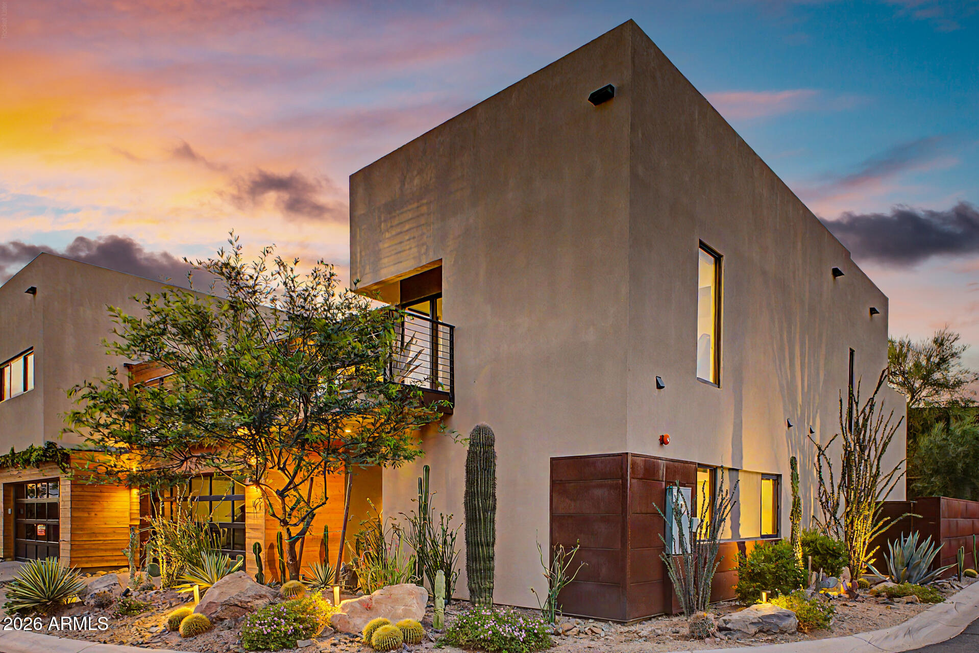 Where sustainable luxury meets sophisticated modern design in the heart of Cave Creek. Nestled within the exclusive Hidden Rock community.  Thoughtfully designed to blend seamlessly with the surrounding desert landscape, this contemporary residence delivers the perfect balance of serenity, architectural sophistication, and effortless indoor-outdoor Arizona living. Walls of glass, soaring ceilings, and clean modern lines flood the home with natural light while framing spectacular desert views. Designed for both elevated entertaining and everyday luxury, the owners' impeccable design selections shine throughout with refined finishes, carefully curated upgrades, and a warm modern aesthetic that feels timeless yet inviting. This highly desirable 4 master-suite floor plan offers exceptional flexibility for multi-generational living, luxury guest accommodations, or lock-and-leave convenience, with each spacious suite featuring spa-inspired en-suite baths and generous walk-in closets for ultimate privacy and comfort. The chef's kitchen is a true showpiece, featuring a premium Thermador paneled refrigerator, a built-in espresso system, designer finishes, and a seamless flow for entertaining. Residents of Hidden Rock enjoy resort-style amenities including a community pool and immediate access to hiking trails, shopping, dining, and a vibrant lifestyle. Benefit from the rare convenience of walkable access to downtown Cave Creek and the acclaimed dining, boutiques, art galleries, and entertainment in neighboring Carefree.