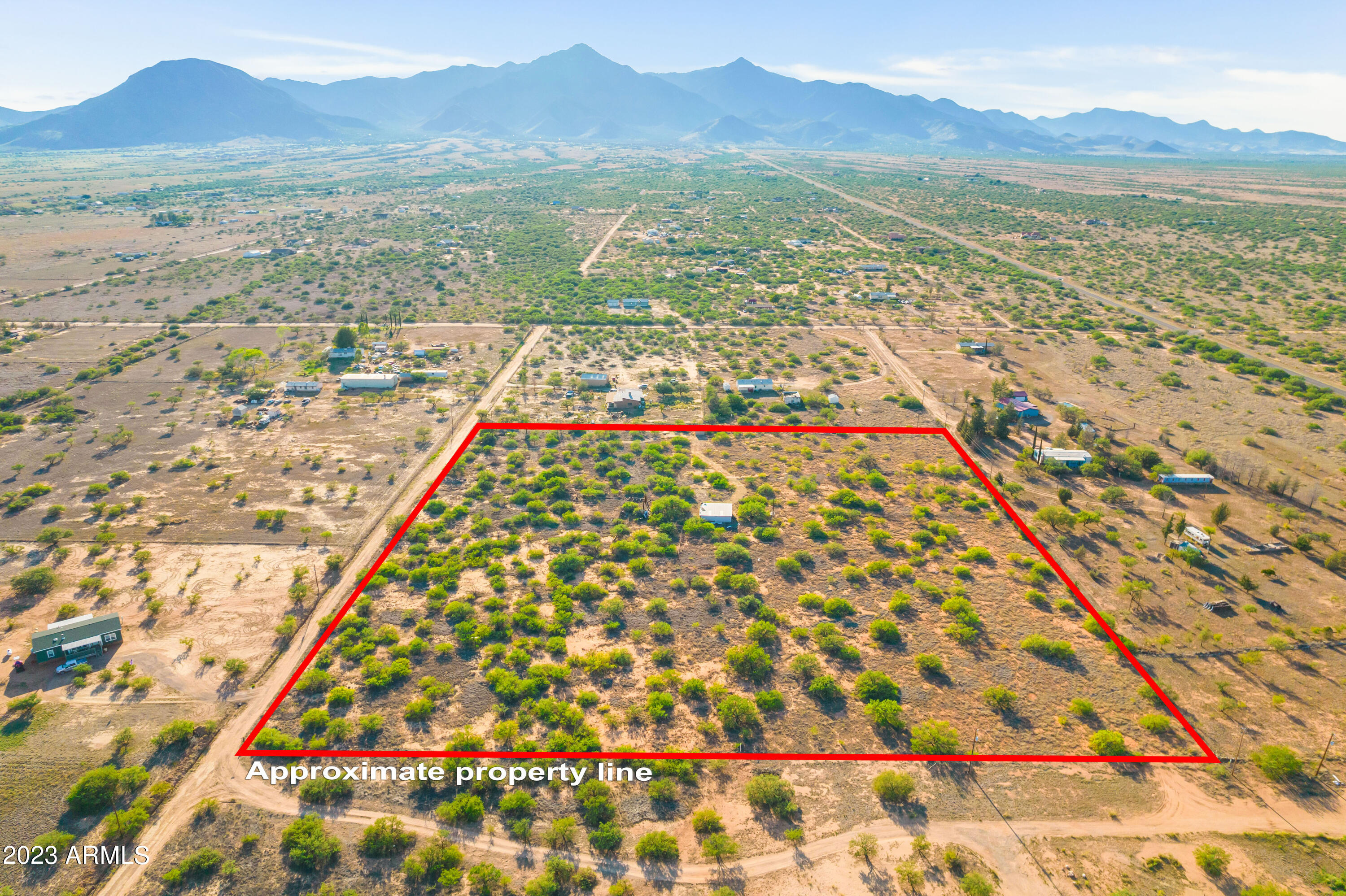 10 acres of land with utilities on the property! 3 well share and electric at the property line. Building in place that can be used as storage or a garage. Corner lot and ready for you to build your dream home and enjoy the beautiful views this property has to offer.
