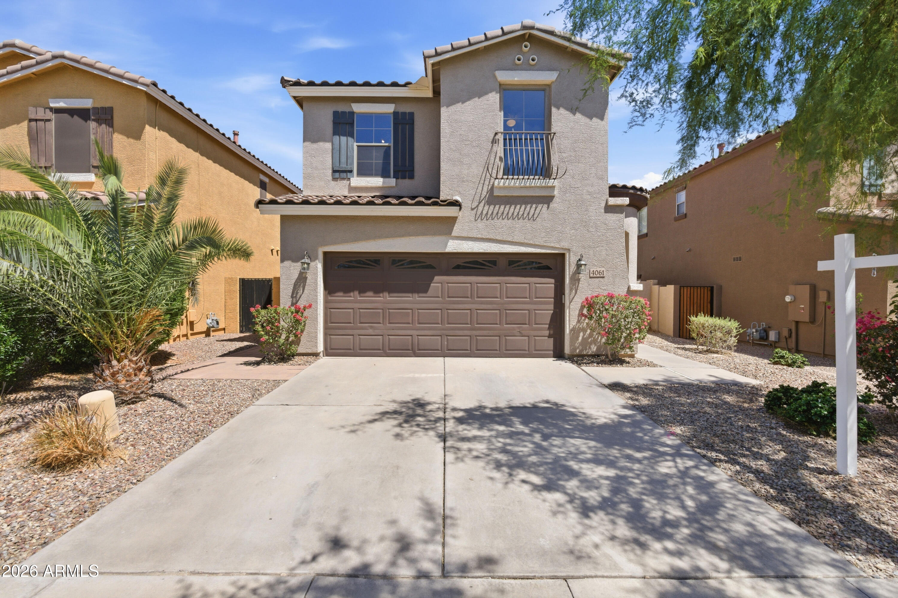 BRAND NEW ROOF!  Beautiful and move-in ready home in Gilbert's award-winning Power Ranch community! This charming property at 4061 E Wagon Ct features fresh interior paint and brand-new carpet throughout, providing a crisp and modern feel. The open layout includes a bright kitchen with granite countertops and white cabinetry. Residents enjoy the premier Power Ranch lifestyle with access to 26 miles of trails, community lakes, resort-style pools, and top-rated schools. With a private backyard and a quiet cul-de-sac location, this home offers the perfect blend of comfort and convenience in a sought-after master-planned community.