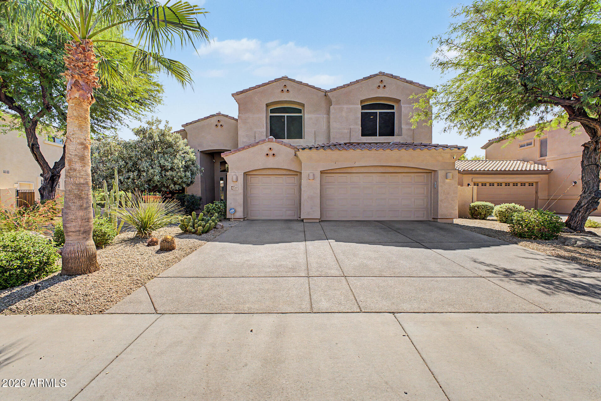 Professional Pictures coming soon - Luxury living meets resort-style outdoor entertaining in this stunning Ashland Ranch home! Pristine and highly upgraded, this spacious 5-bedroom, 3-bath residence offers 3,690 sq. ft. of beautifully designed living space. Soaring ceilings, porcelain plank tile flooring, new carpet, and a remodeled great room with stacked stone accents, media wall, art niches, and a 72'' linear gas fireplace create an impressive interior. The remodeled kitchen features granite countertops, travertine backsplash, KitchenAid appliances, a huge walk-in pantry, and abundant cabinet space. Major updates include a new roof (2025), dual-stage A/C (2023), updated lighting, newer garage doors, and new artificial turf (2026). Relax in the resort-style backyard with a remodeled pebble sheen saltwater pool, waterfall, spa, built-in BBQ, outdoor bar, and full-length covered patio. Close to San Tan Village with tons of shopping, dining and entertainment. Easy access to the 202 freeway.  This home shows pride of ownership throughout.