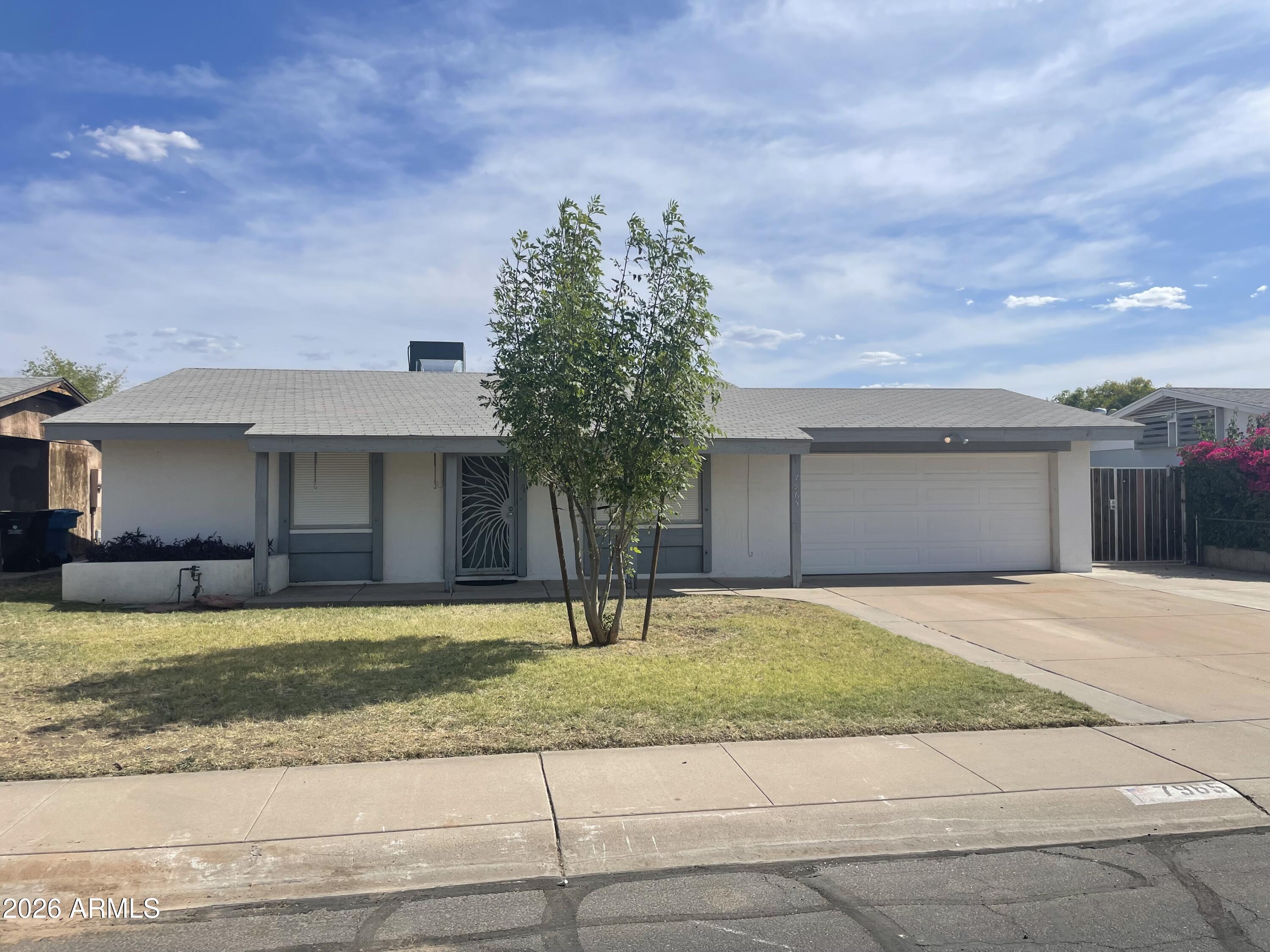 Opportunity meets value in this spacious 3-bed, 2-bath home packed with major upgrades where they matter most! Enjoy peace of mind with a nearly new Goettl air conditioning unit, newer water heater, clothes washer, water softener, solar system and an upgraded electrical panel. This property offers incredible potential for the right buyer to build sweat equity through cosmetic updates and personal touches. Outside, there's room for all your toys and projects with a 2-car garage, oversized driveway, RV gate, and dedicated RV parking. Need storage or workspace? The impressive 12x24 storage building has you covered. Relax or entertain year-round beneath the massive 13.5x34 covered patio--perfect for Arizona outdoor living. A rare opportunity to own a home with unlimited potential.